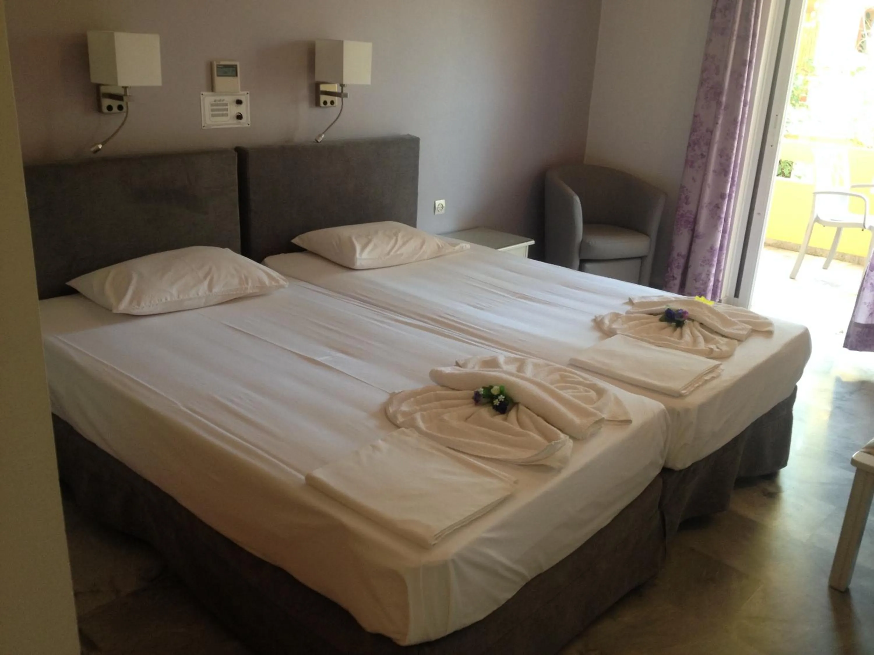 Bed in Kyriaki Hotel