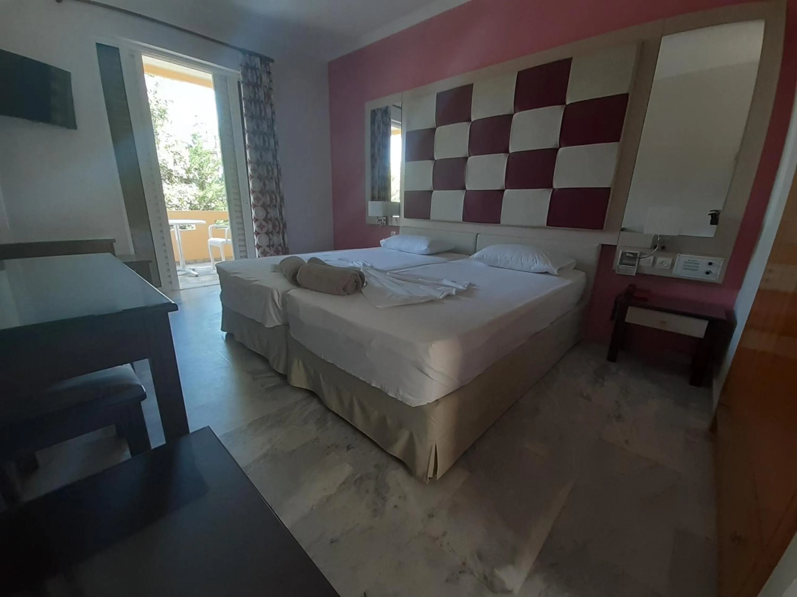 Bed in Kyriaki Hotel
