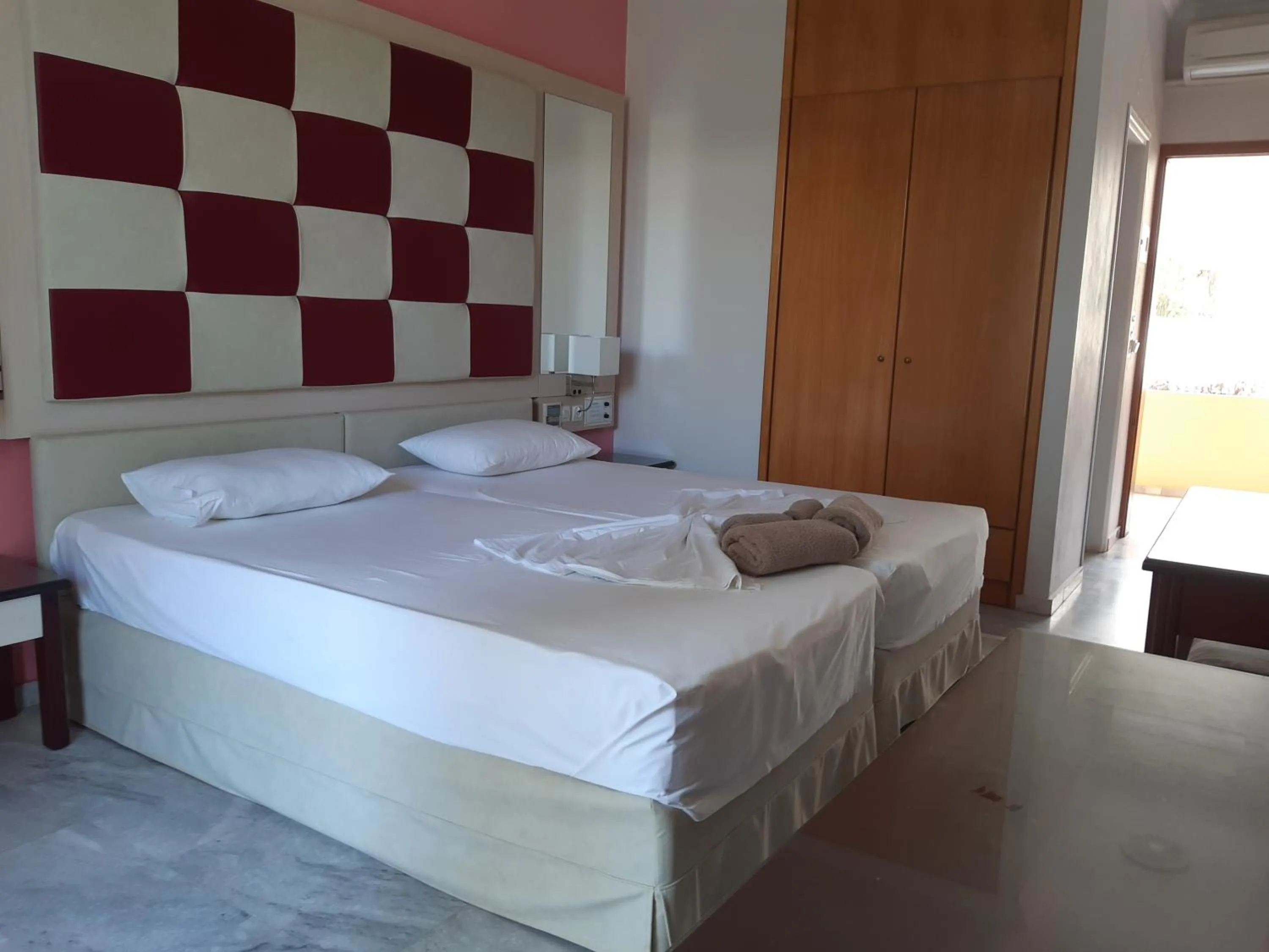 Bed in Kyriaki Hotel