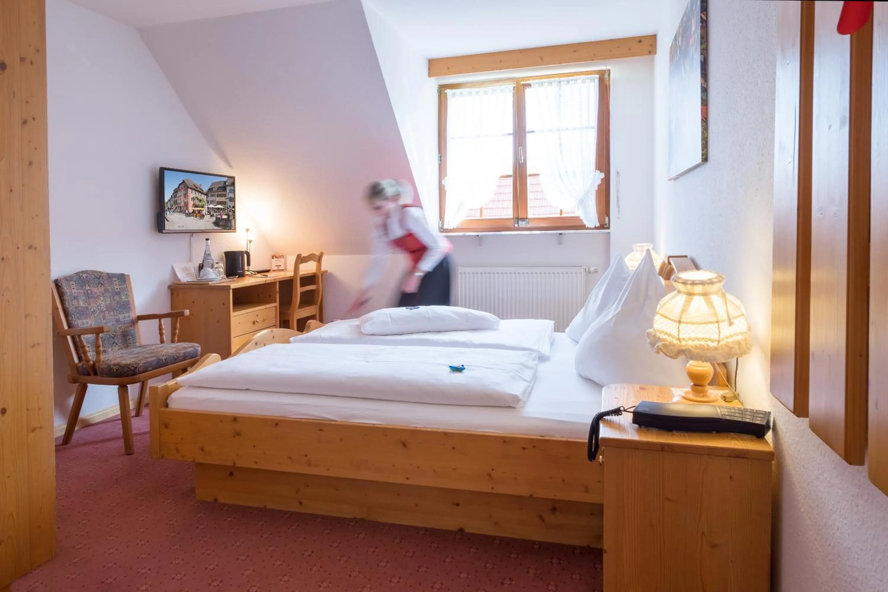 Bed in Hotel der Löwen in Staufen