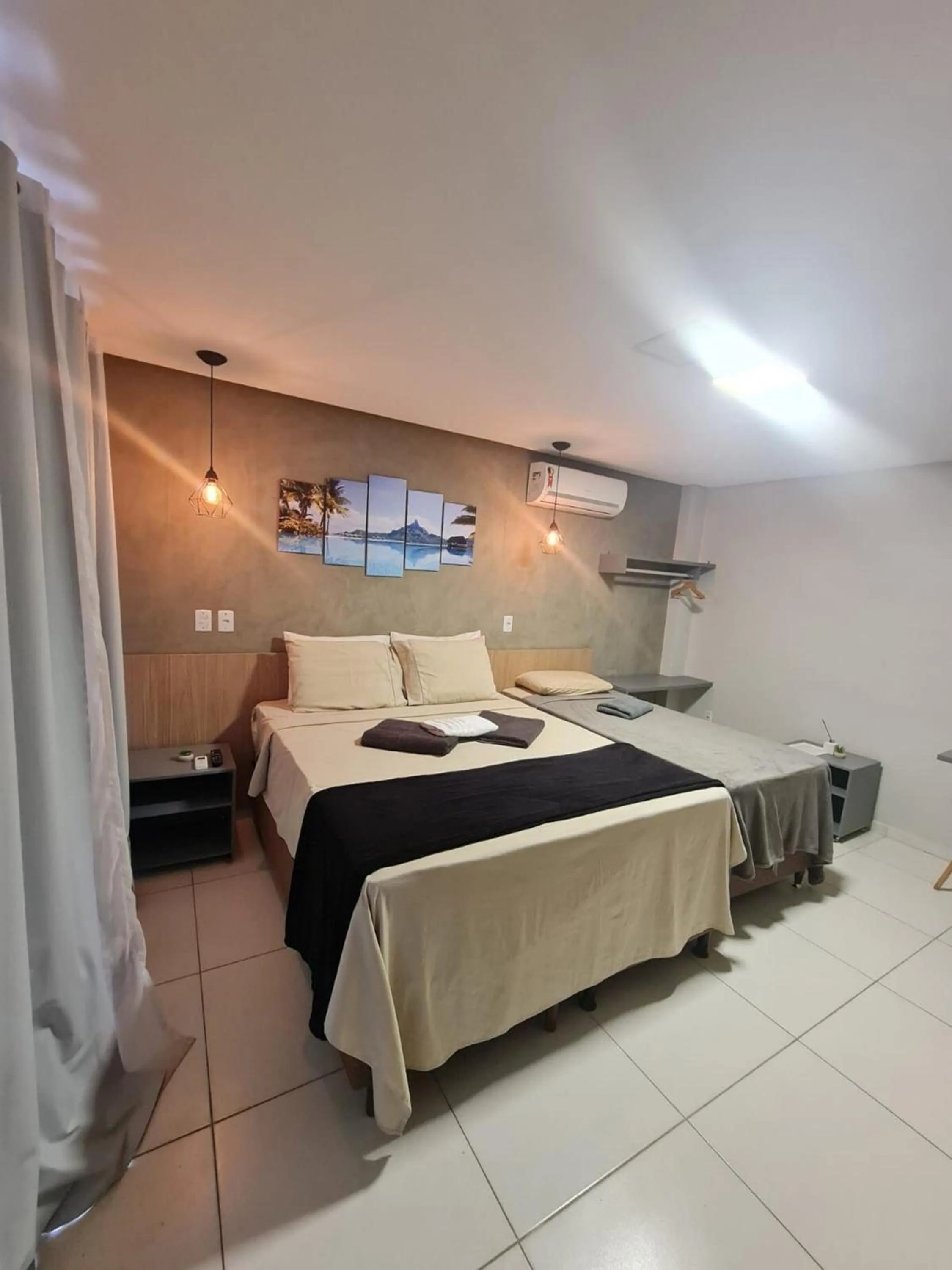 Bed in Pousada Maré do Francês