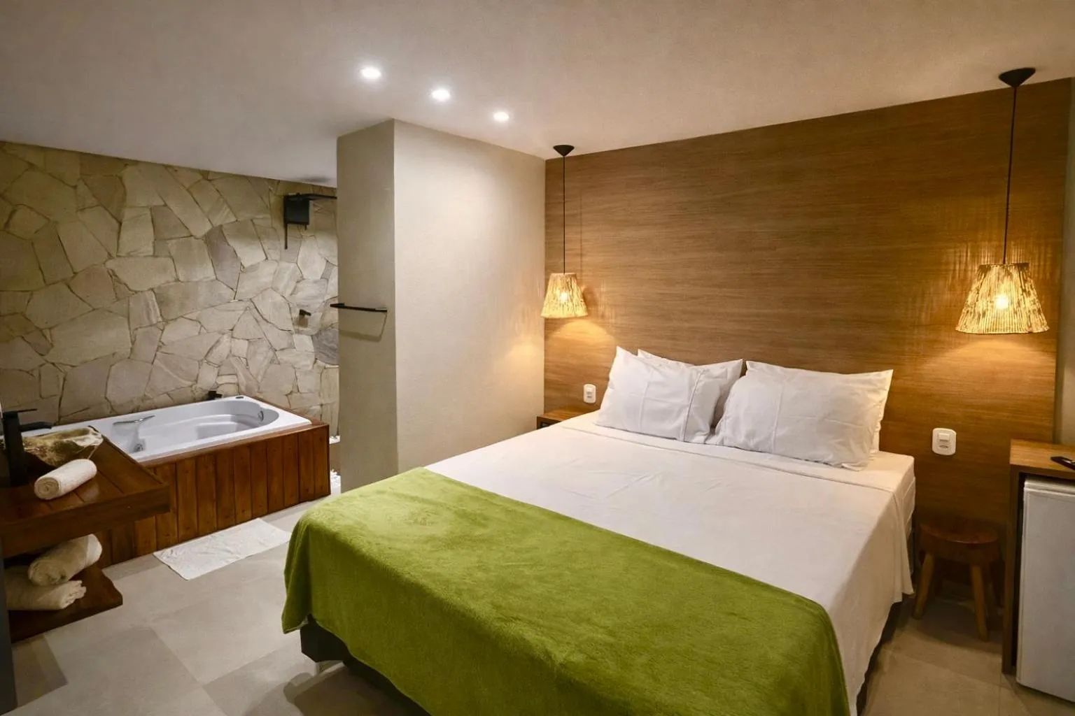 Bed in Pousada Maré do Francês