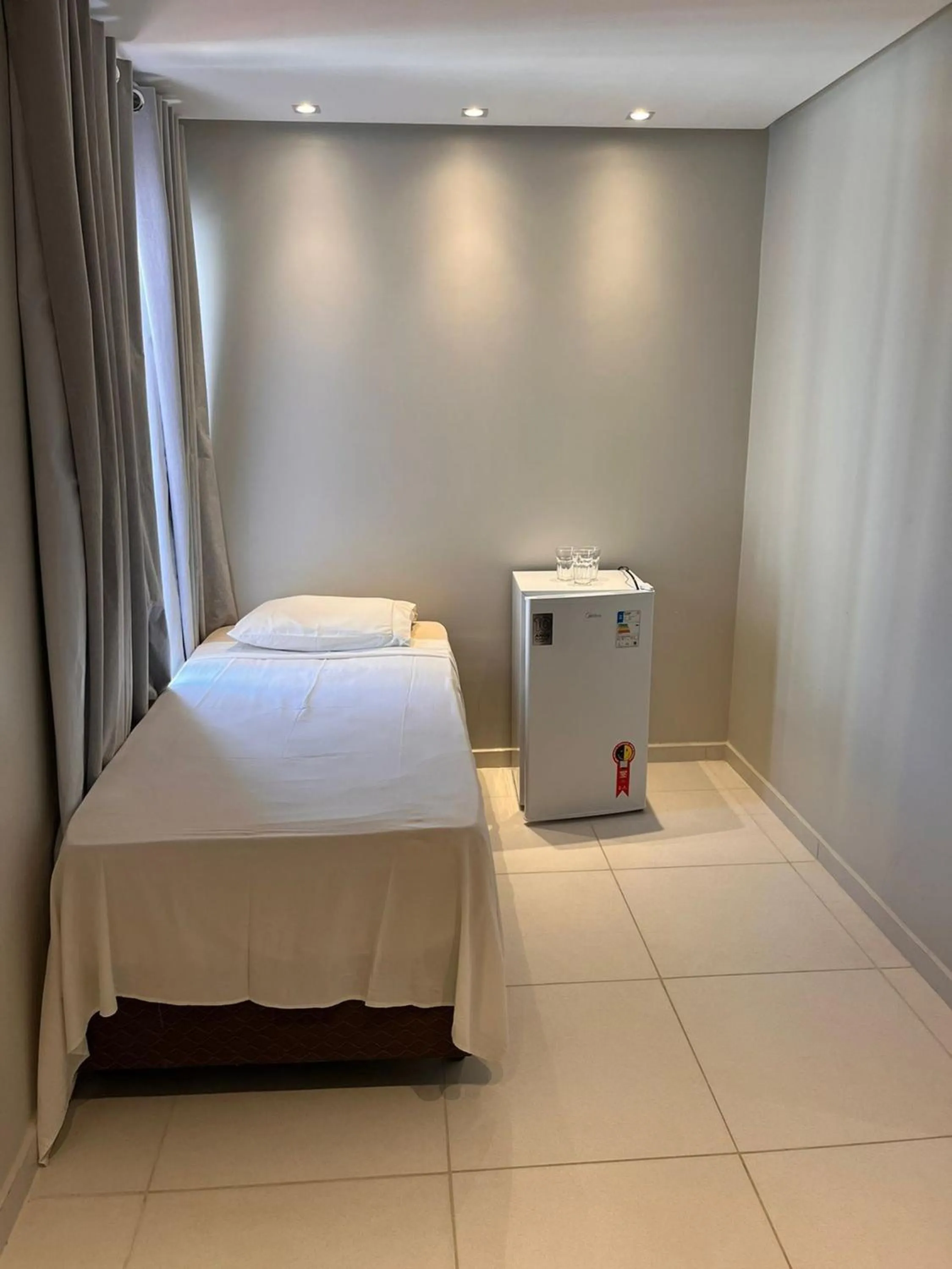 Bed in Pousada Maré do Francês