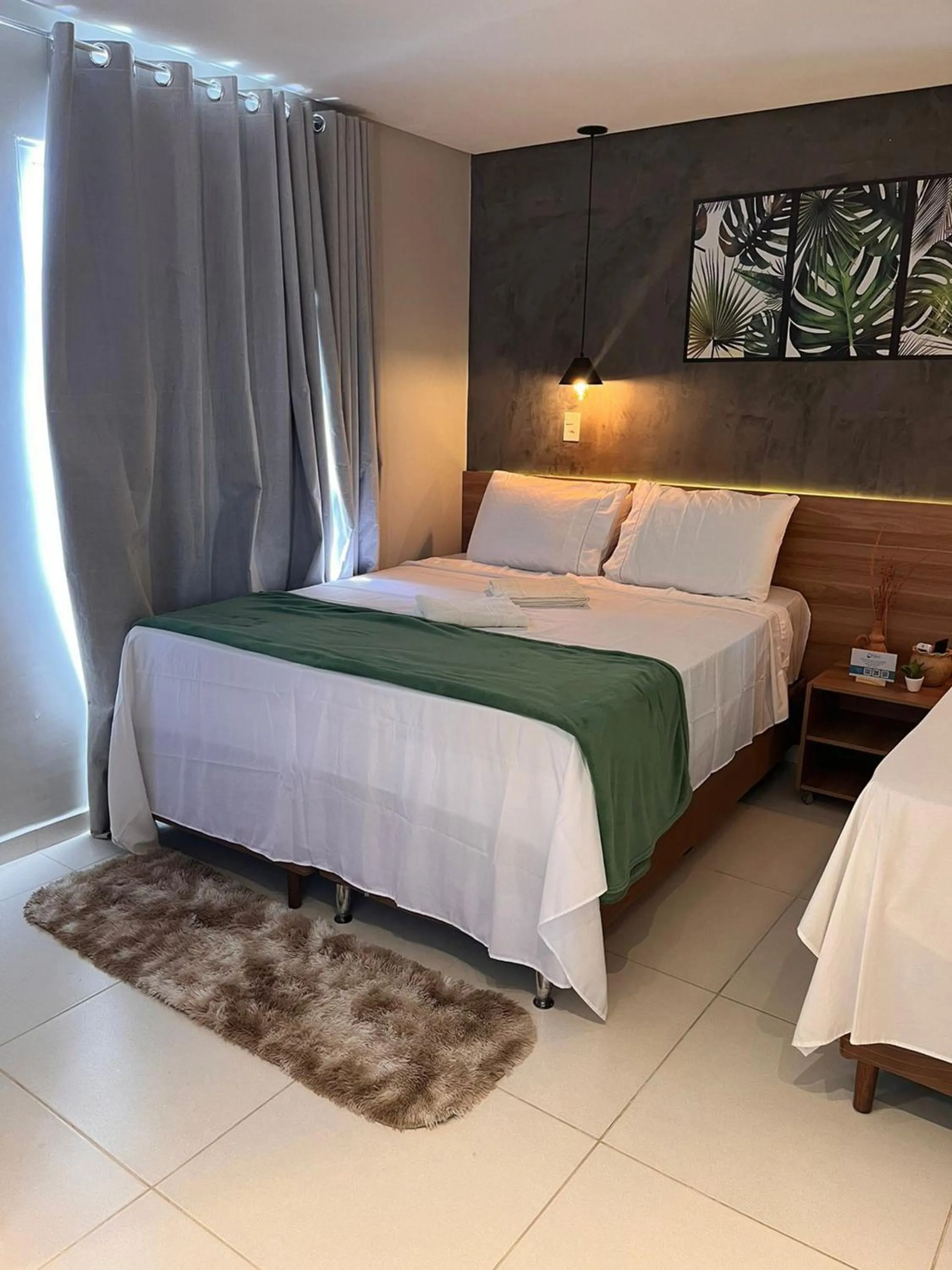 Bed in Pousada Maré do Francês