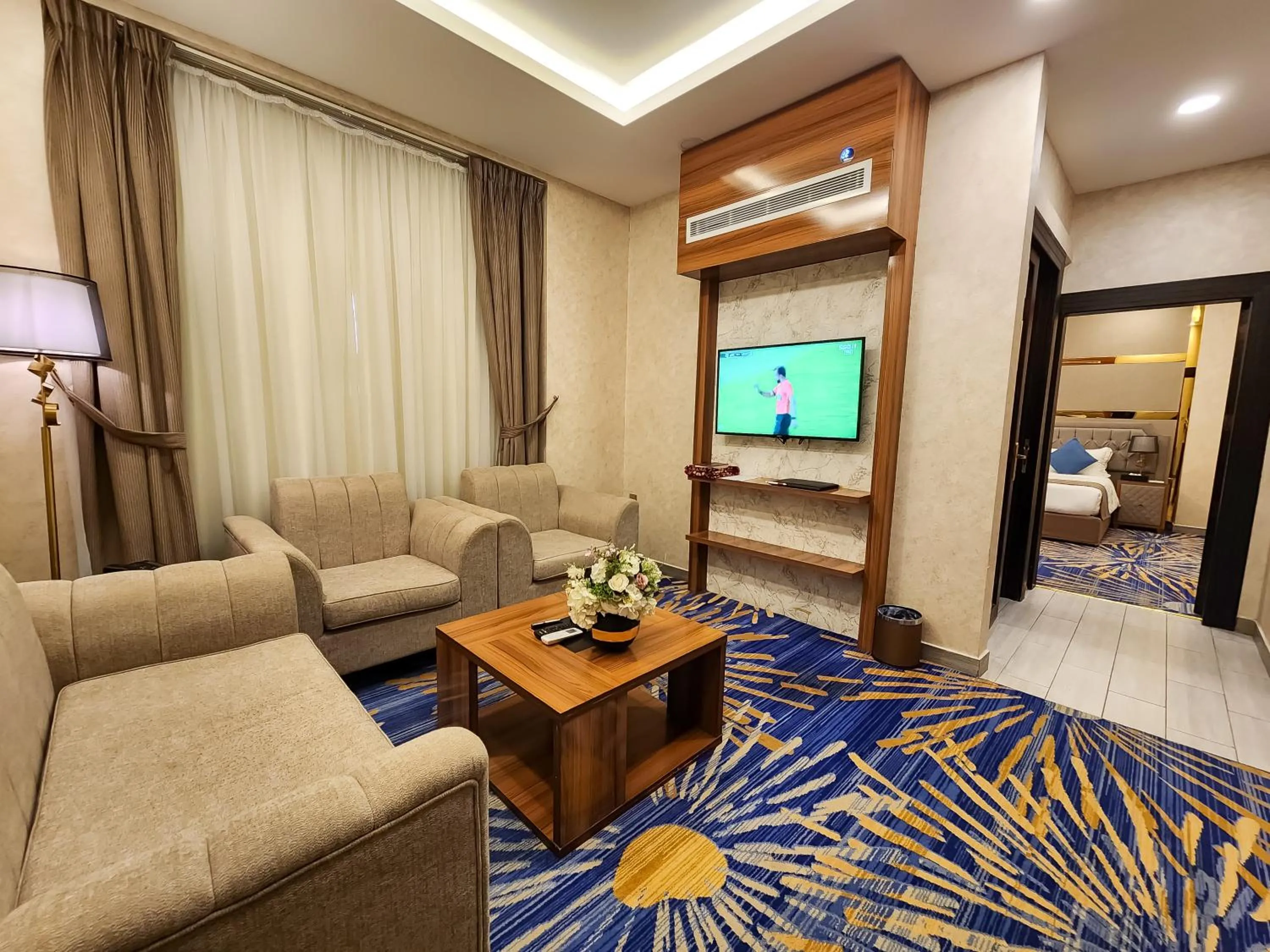 Communal lounge/ TV room in Holiday Al Khaleej Hotel