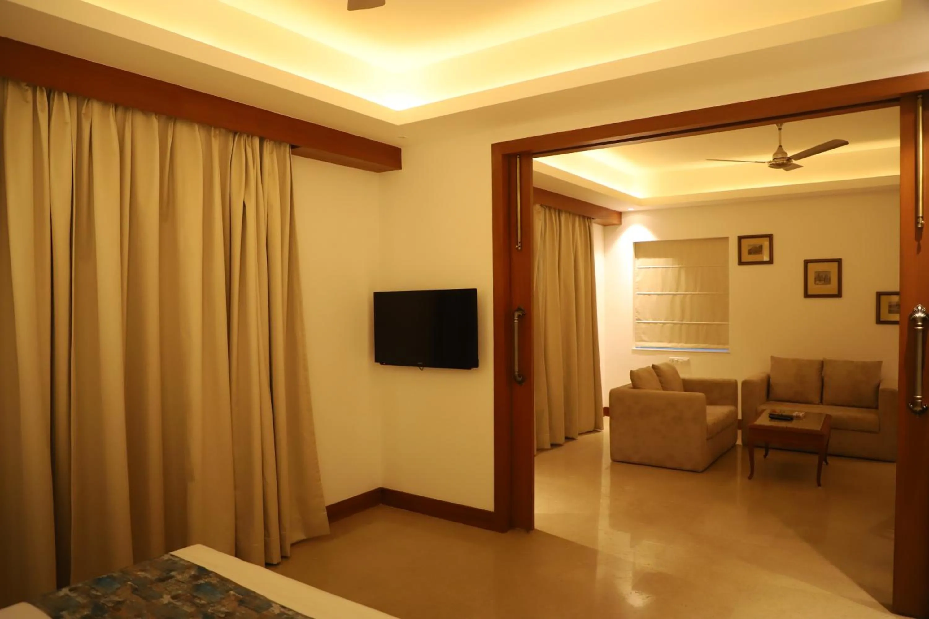 Communal lounge/ TV room in Hotel Chandela Khajuraho