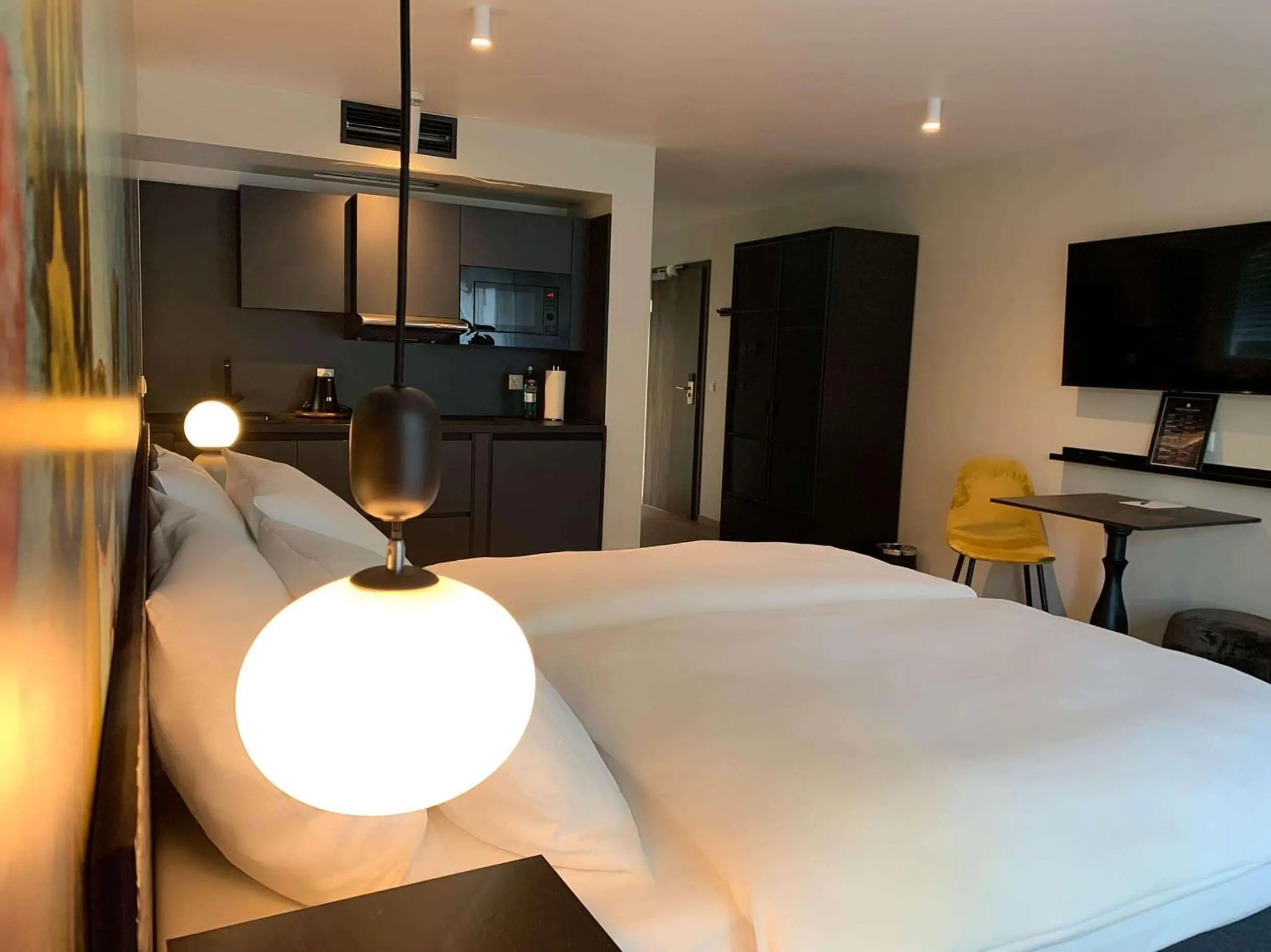 Bed in ANA Living Karlsruhe by Arthotel ANA