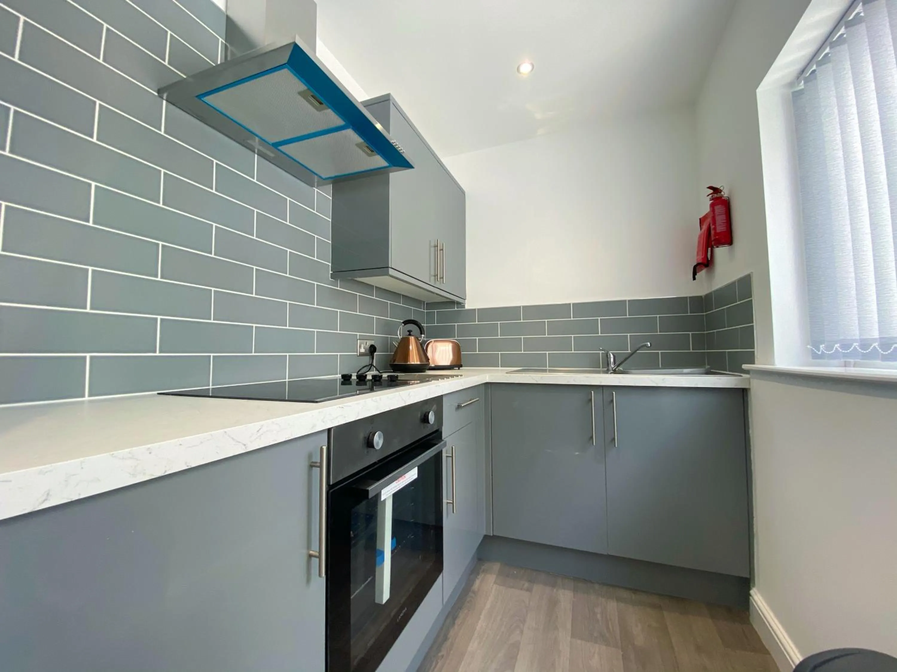 Kitchen or kitchenette in Kensington Suite Sasco Apartments