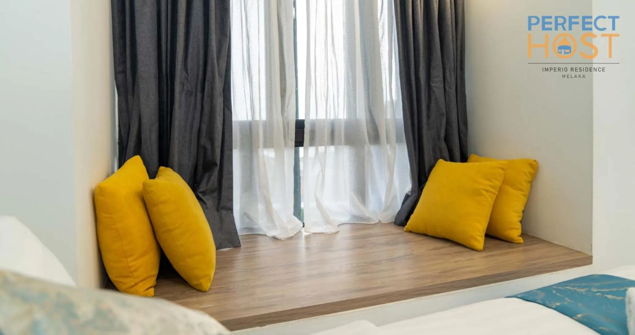 Seating area, Bed in Imperio Residence Seafront by Perfect Host