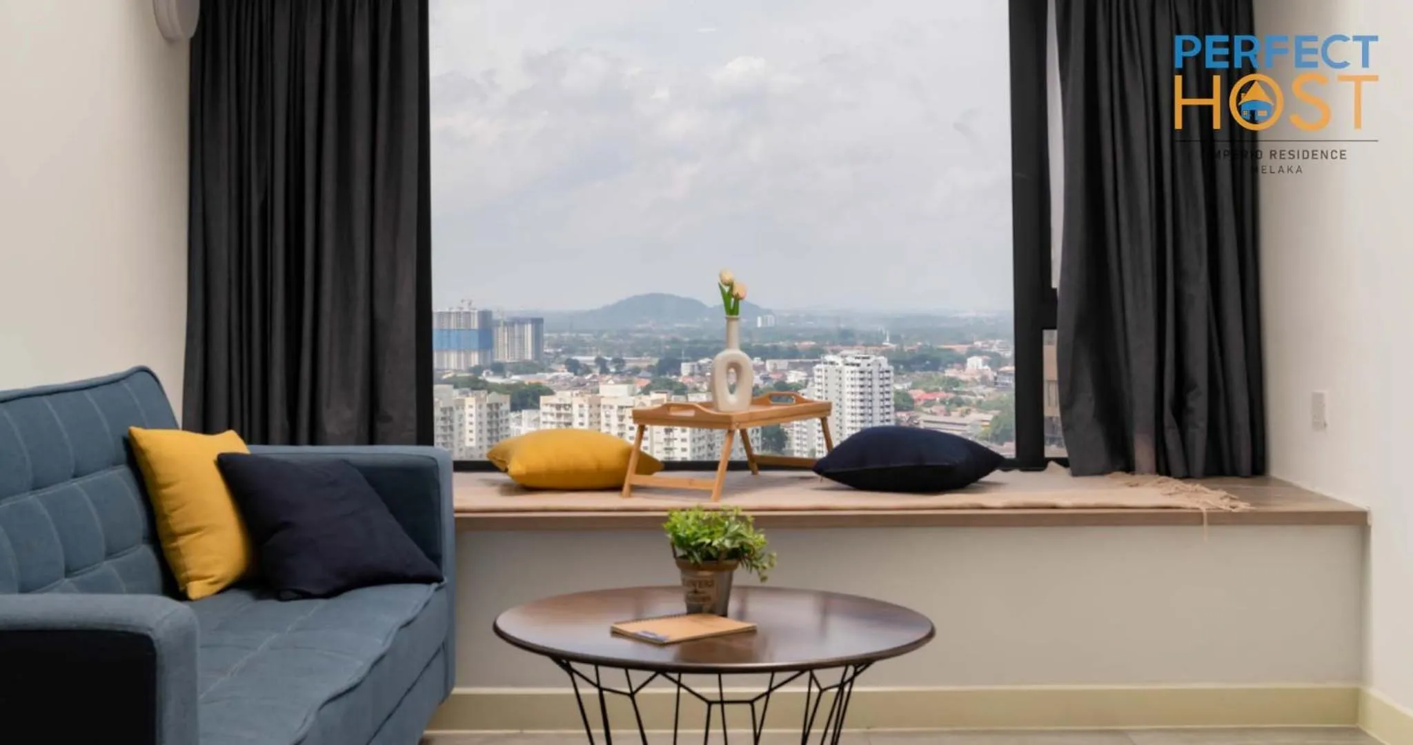 Living room in Imperio Residence Seafront by Perfect Host