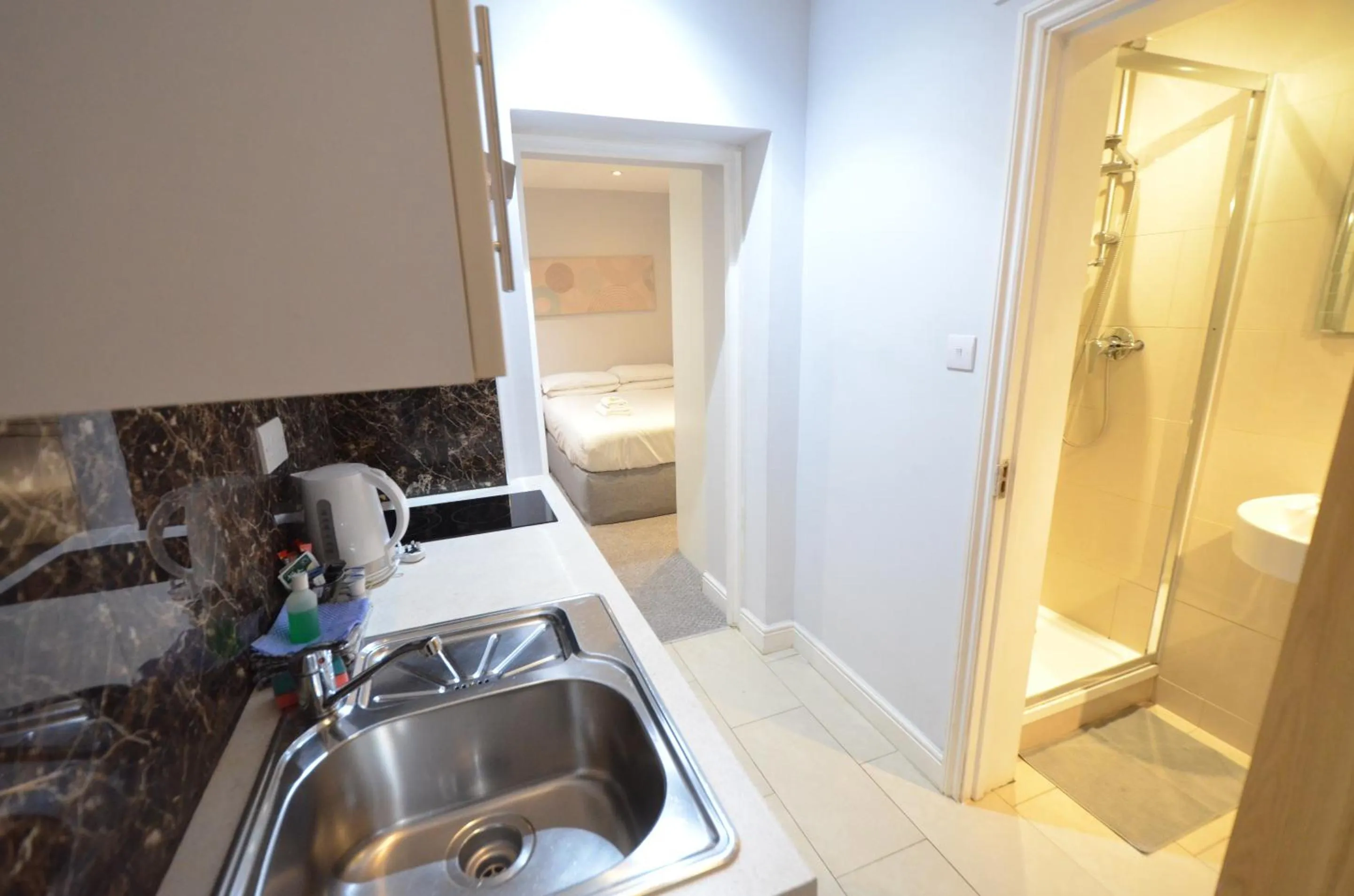 Bedroom in Amber Residence Hotel-Suites