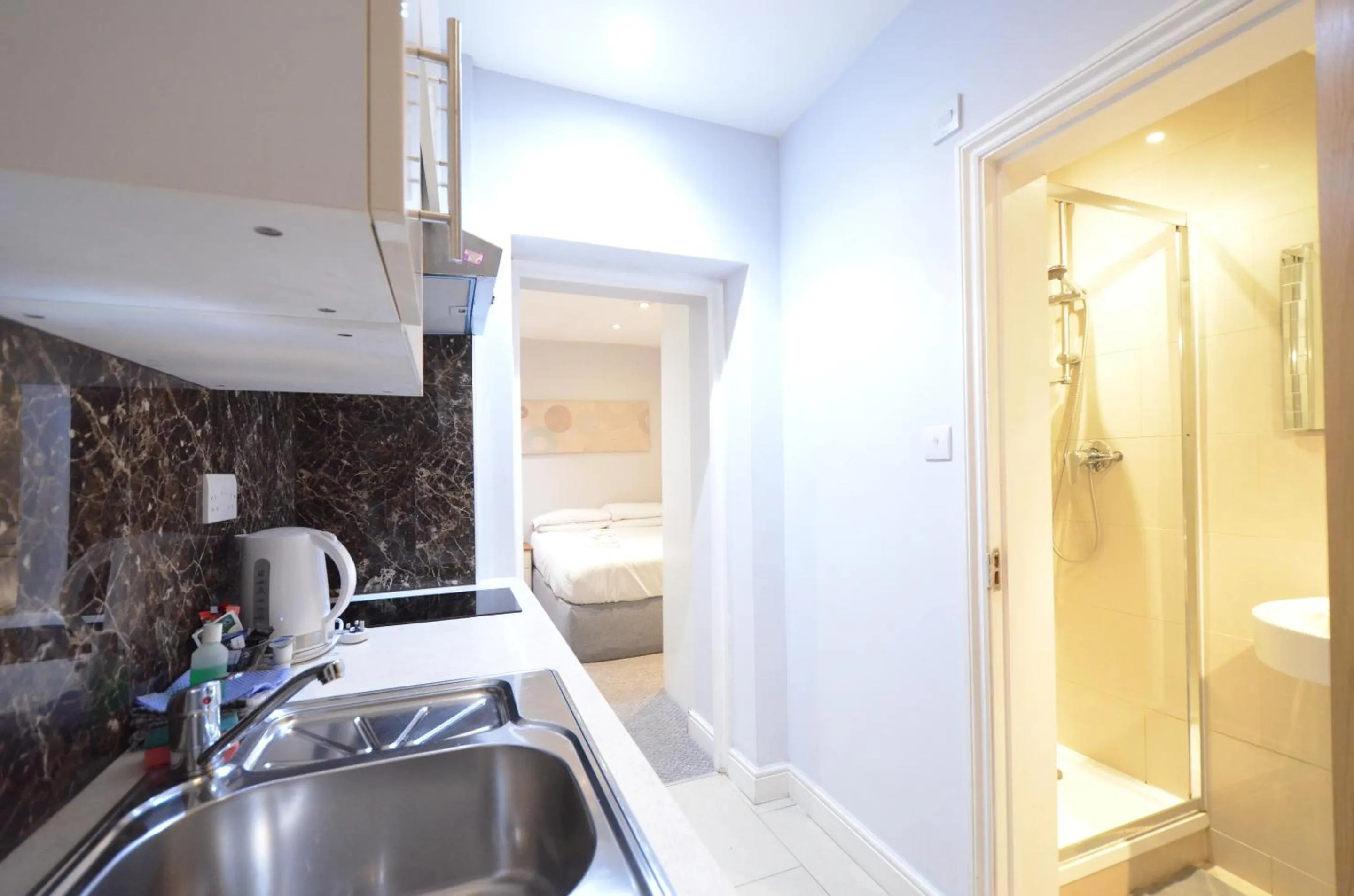 Bedroom in Amber Residence Hotel-Suites