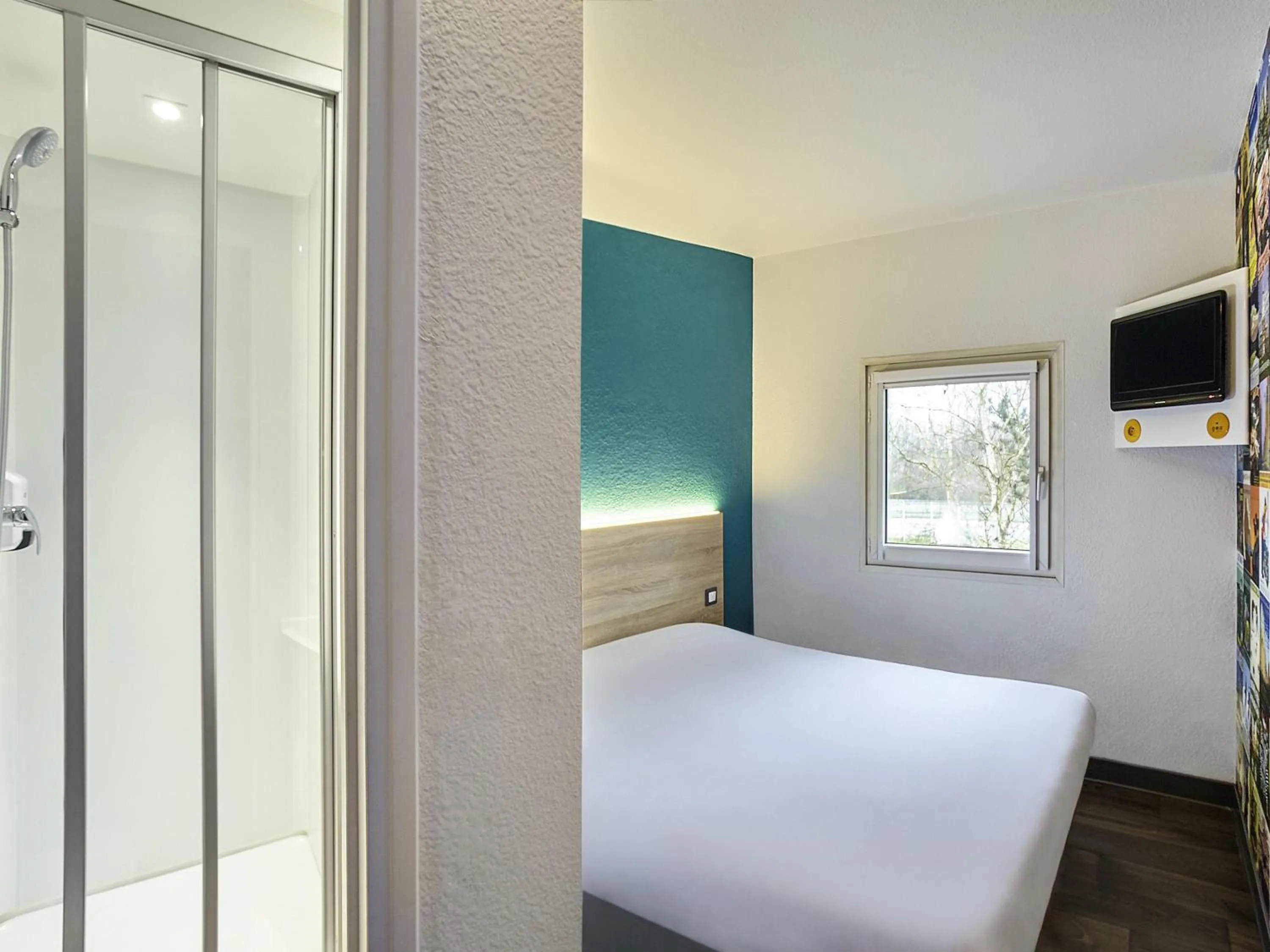 Bedroom, Bed in hotelF1 Saint Witz A1 Hôtel