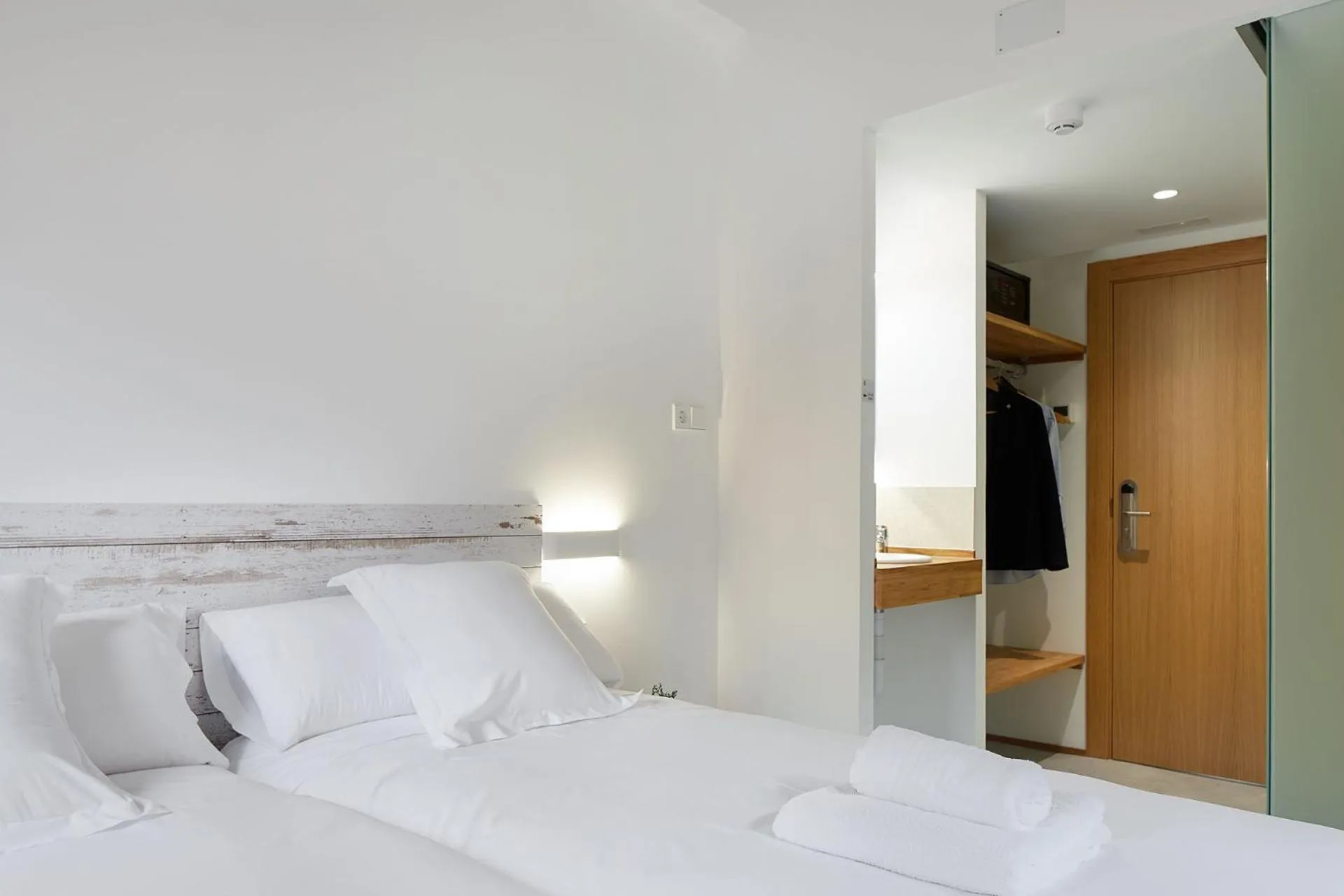 Bed in IRAIPE Estella Rooms Auto Check-in