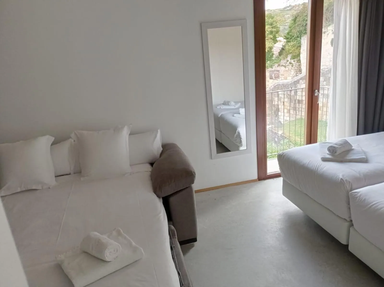 Bed in IRAIPE Estella Rooms Auto Check-in