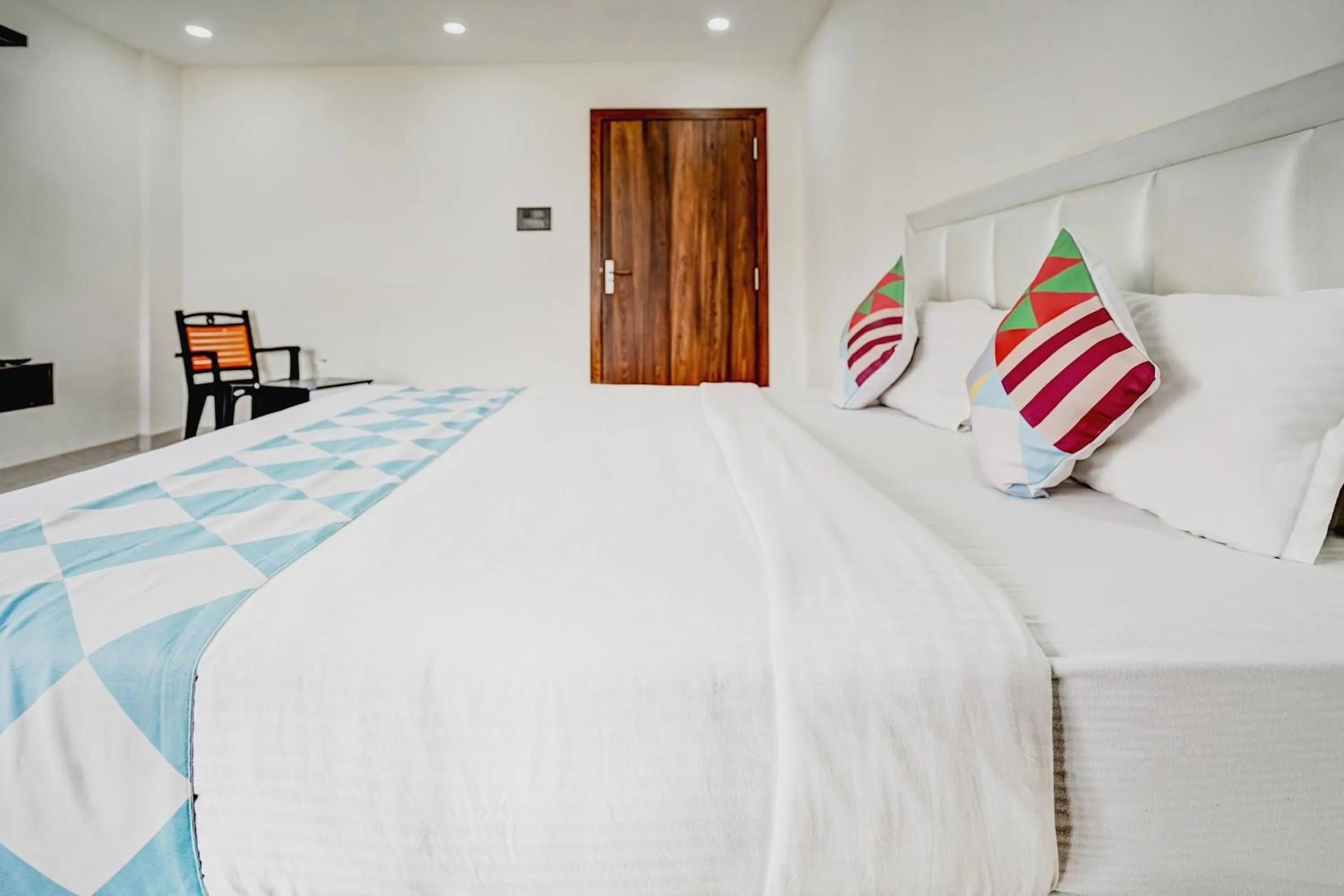 Bedroom, Bed in Capital O Sayhallo Prime Residency