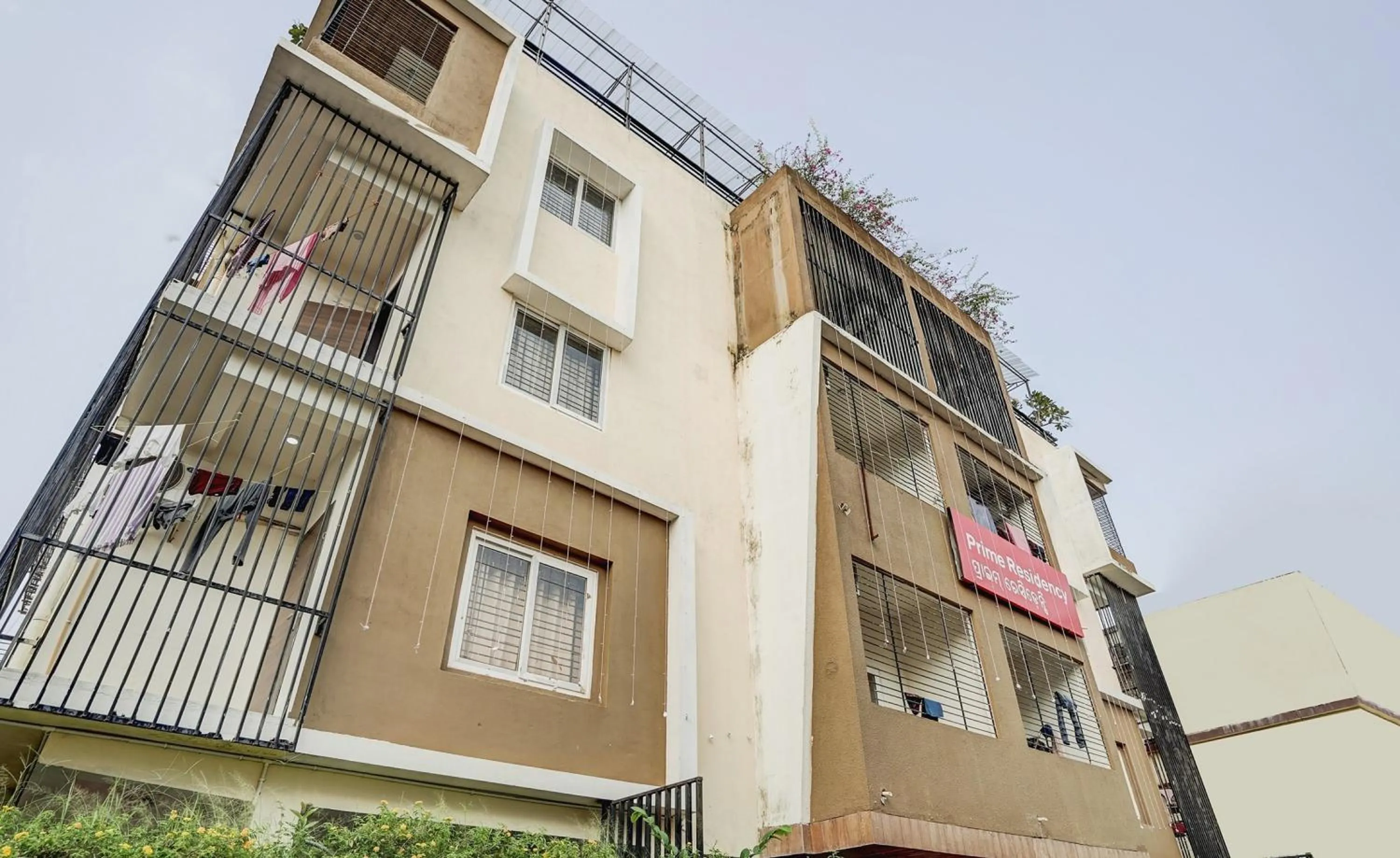 Facade/entrance in Capital O Sayhallo Prime Residency