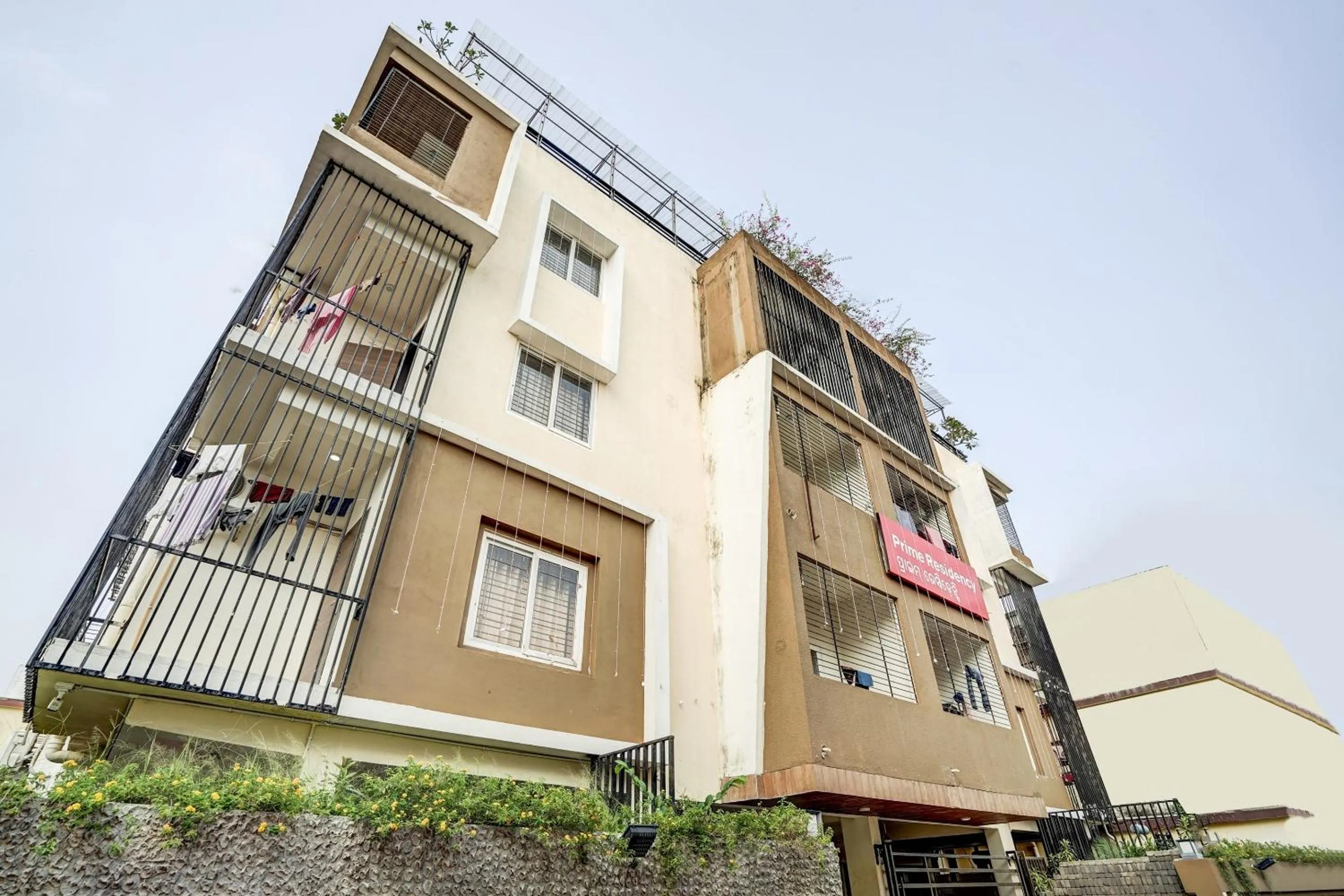 Facade/entrance in Capital O Sayhallo Prime Residency