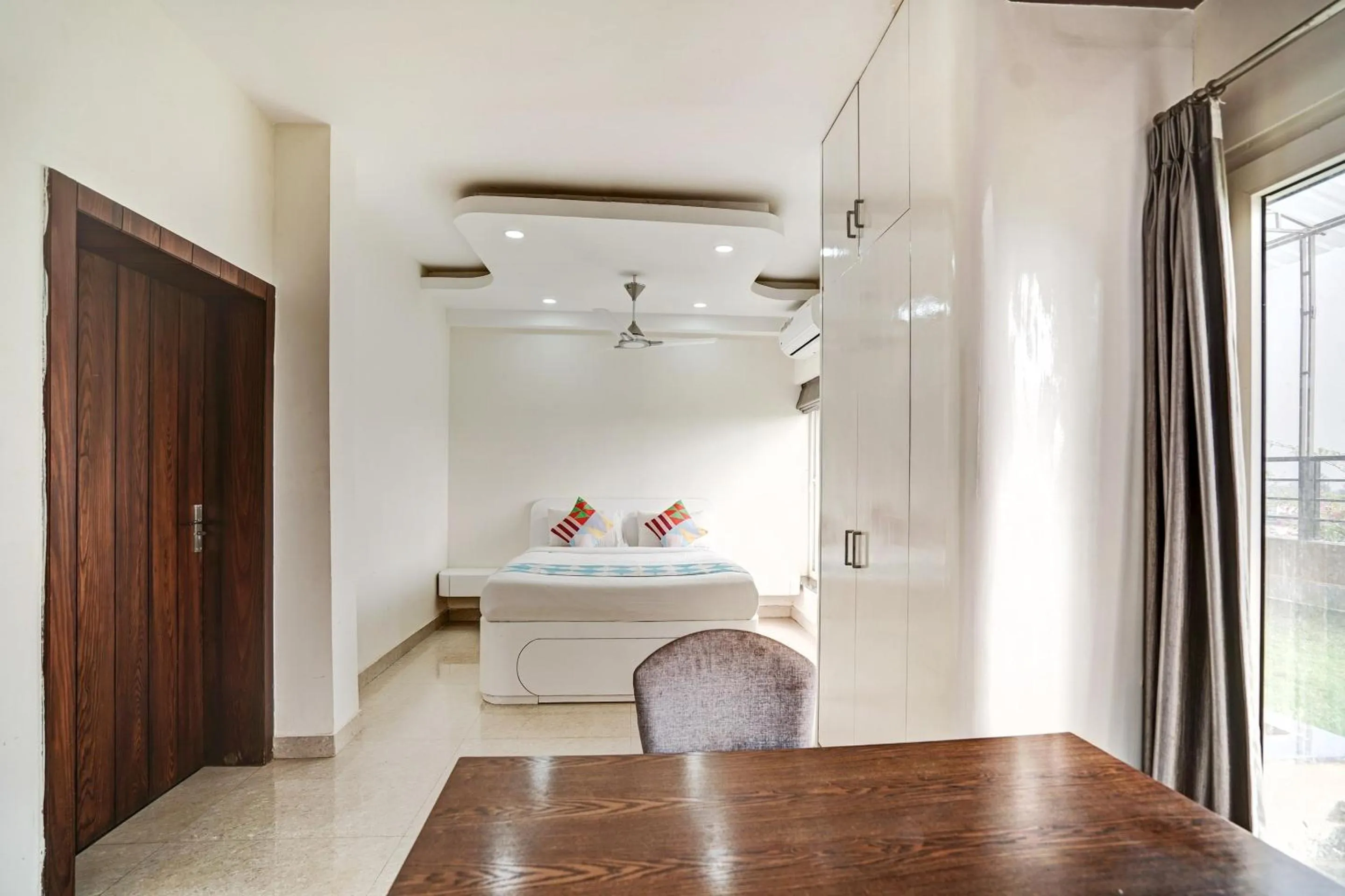 Bedroom, Bed in Capital O Sayhallo Prime Residency