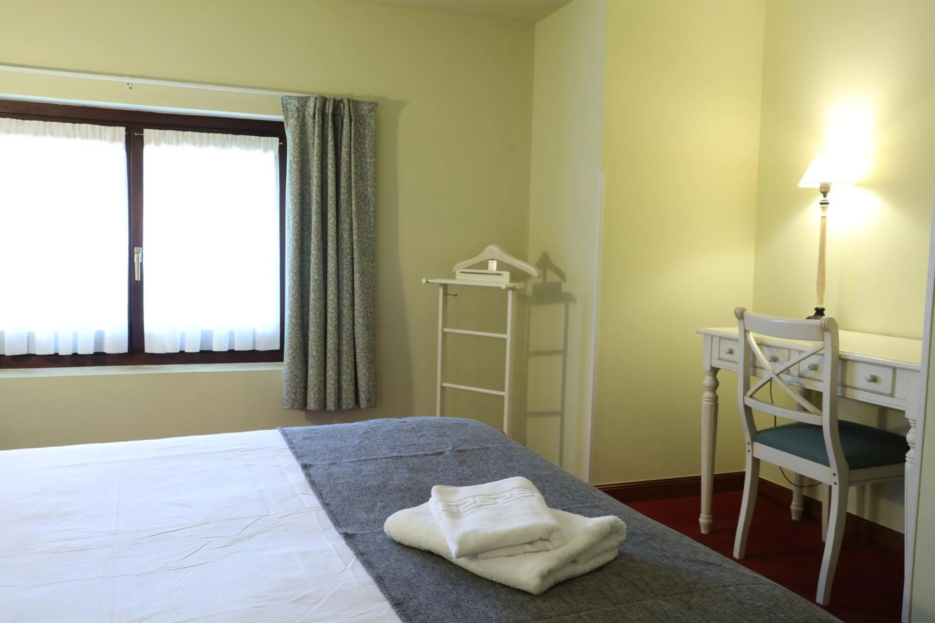 Bed in IRAIPE Ongi Hotel Auto Check-in