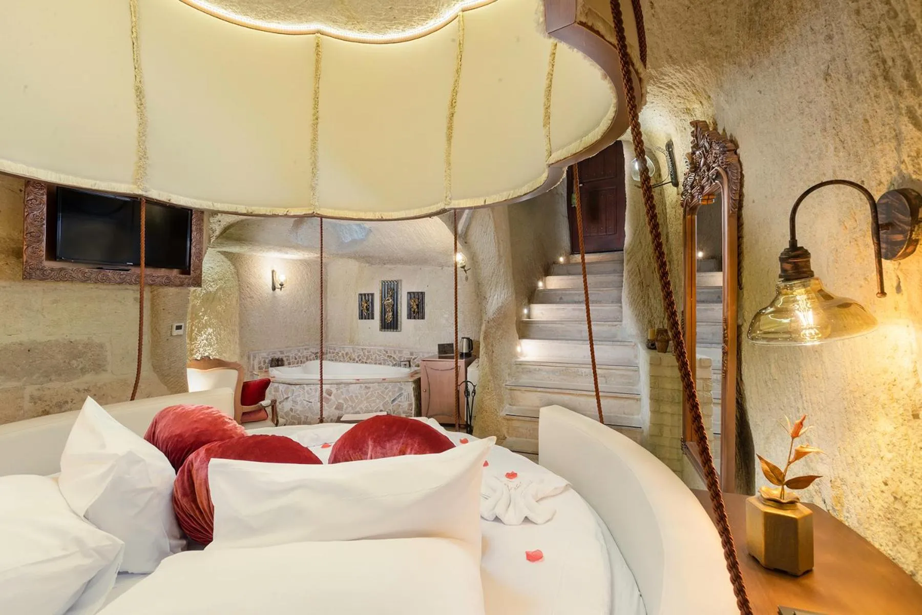 Bed in Elysion Cave Suites