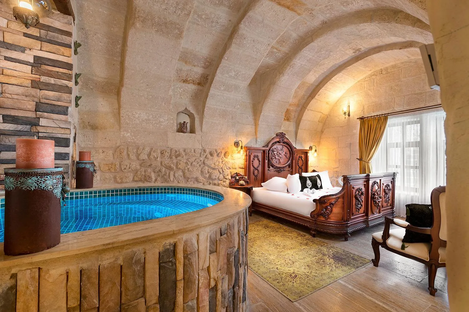 Bed in Elysion Cave Suites