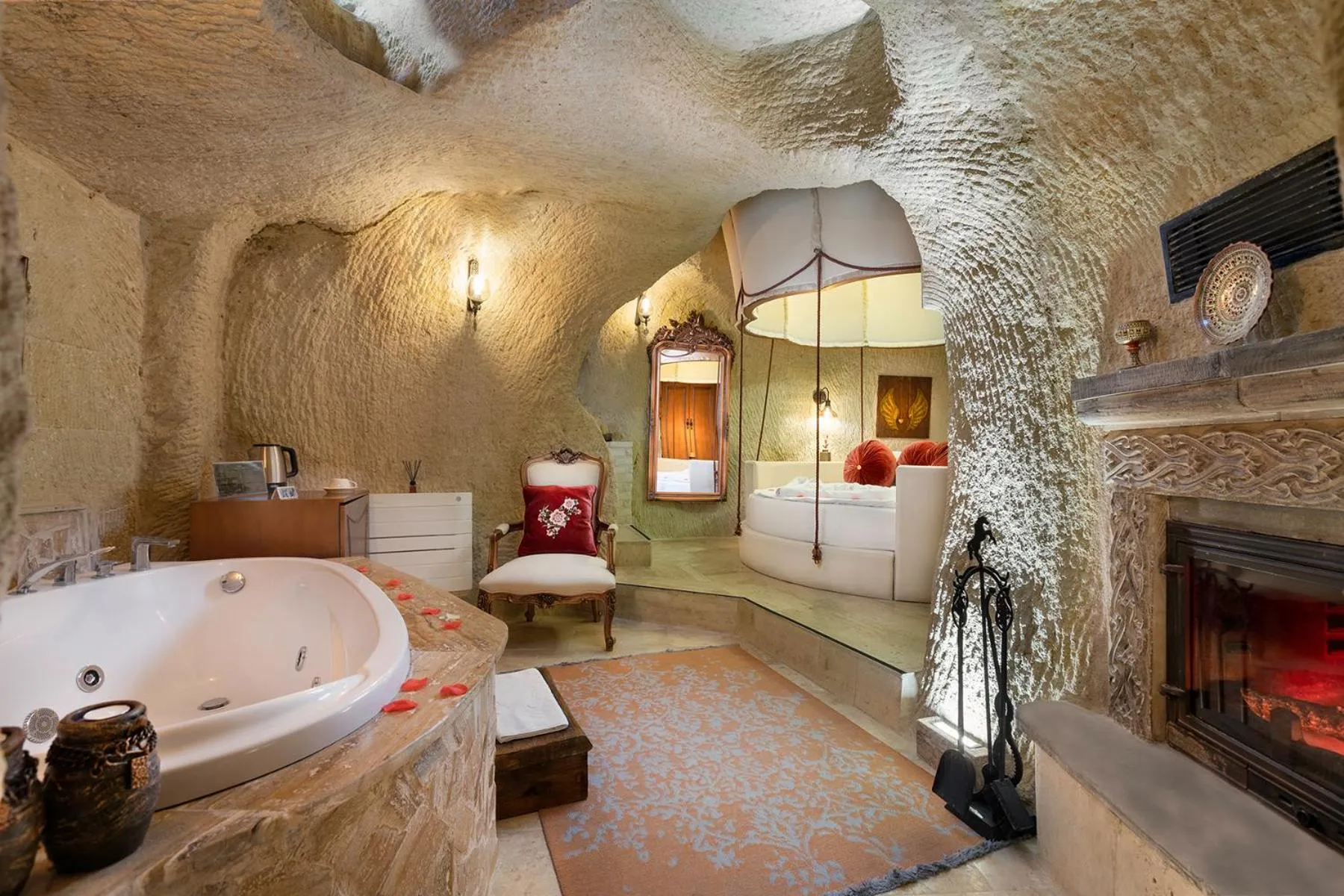 Bed in Elysion Cave Suites