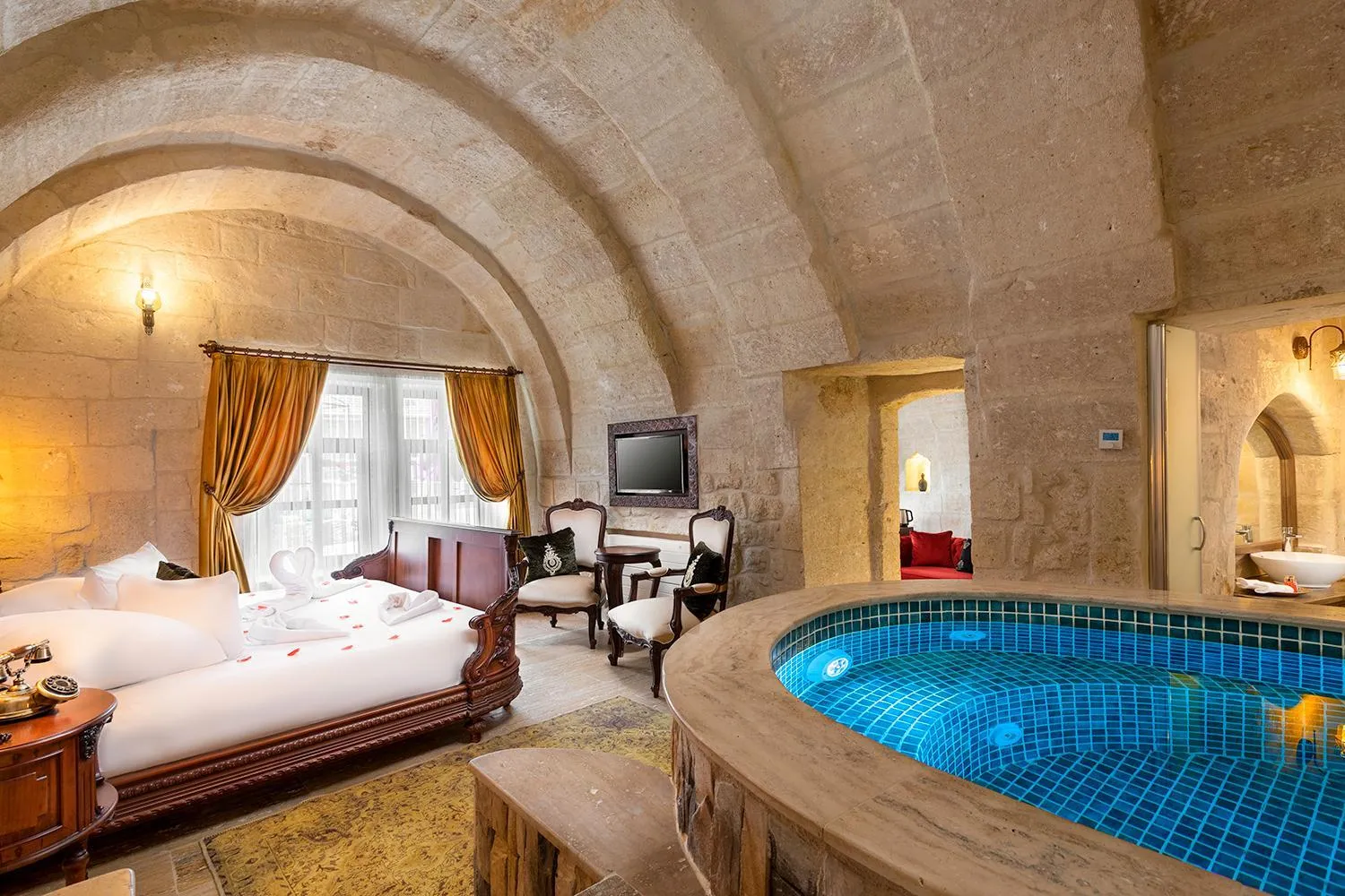 Bed in Elysion Cave Suites