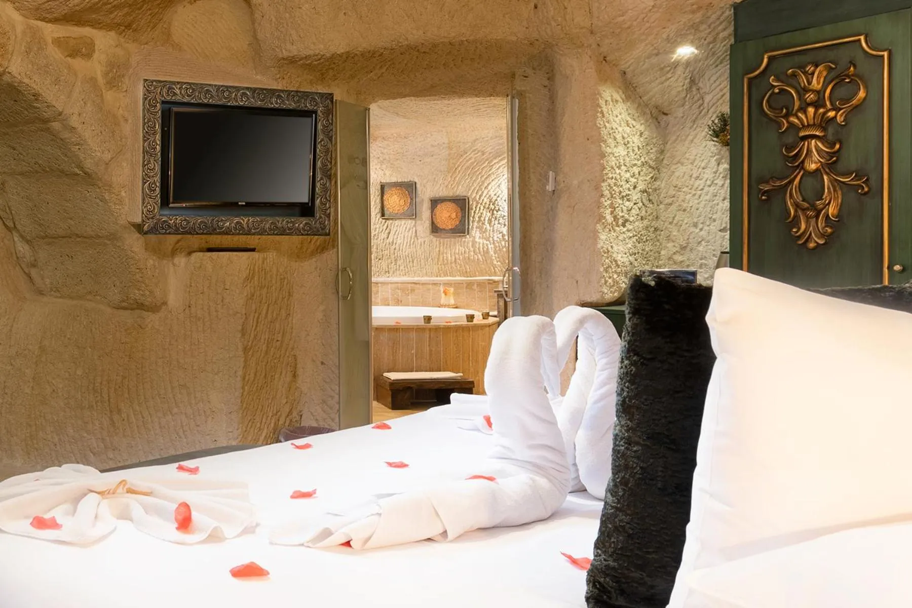 Bed in Elysion Cave Suites