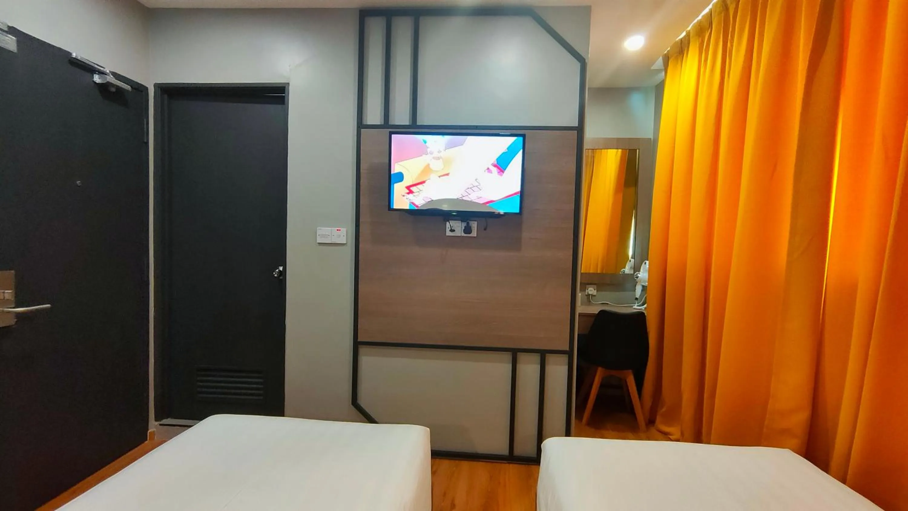 Photo of the whole room, Bed in Uptown Hotel