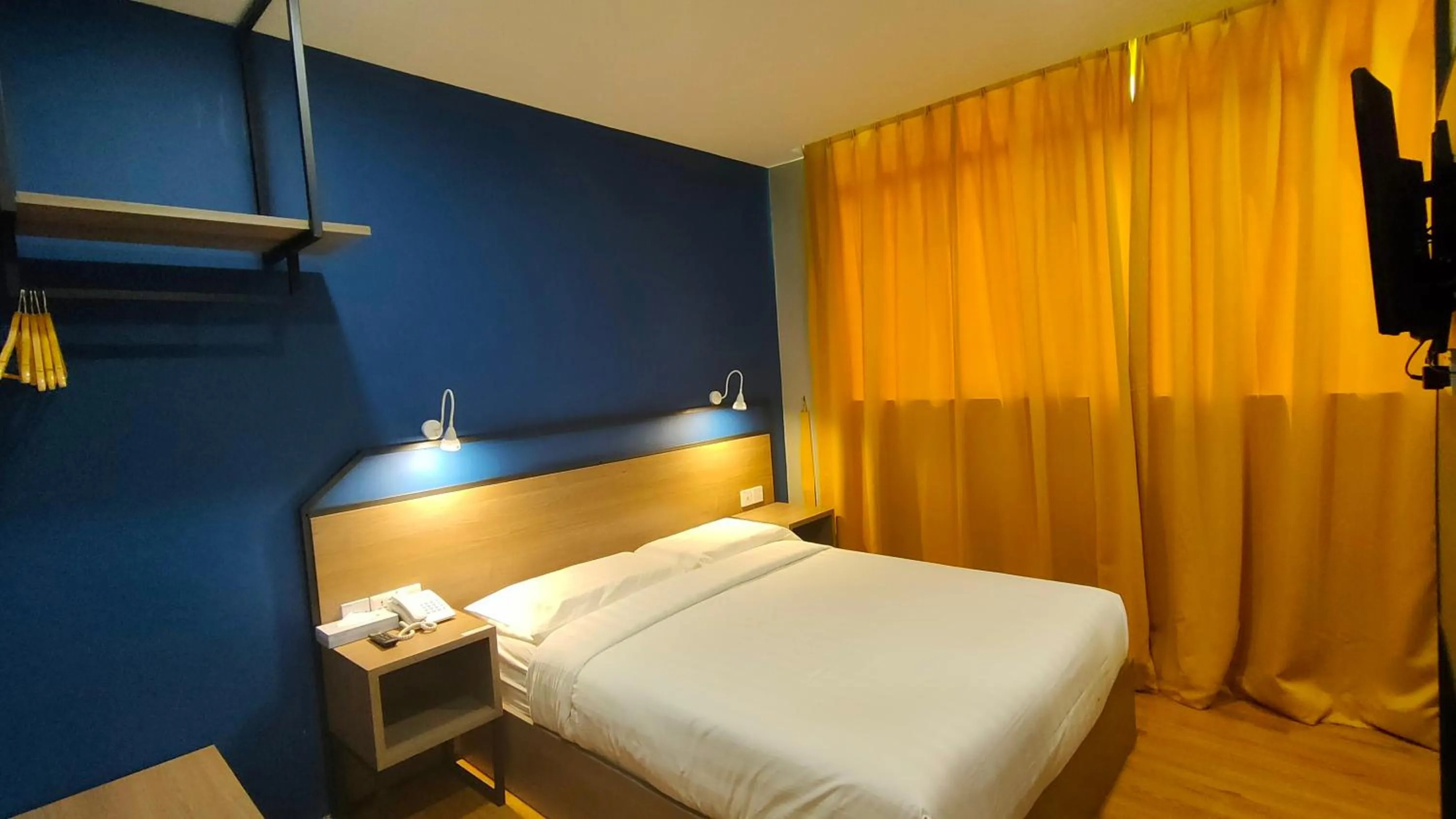 Photo of the whole room, Bed in Uptown Hotel