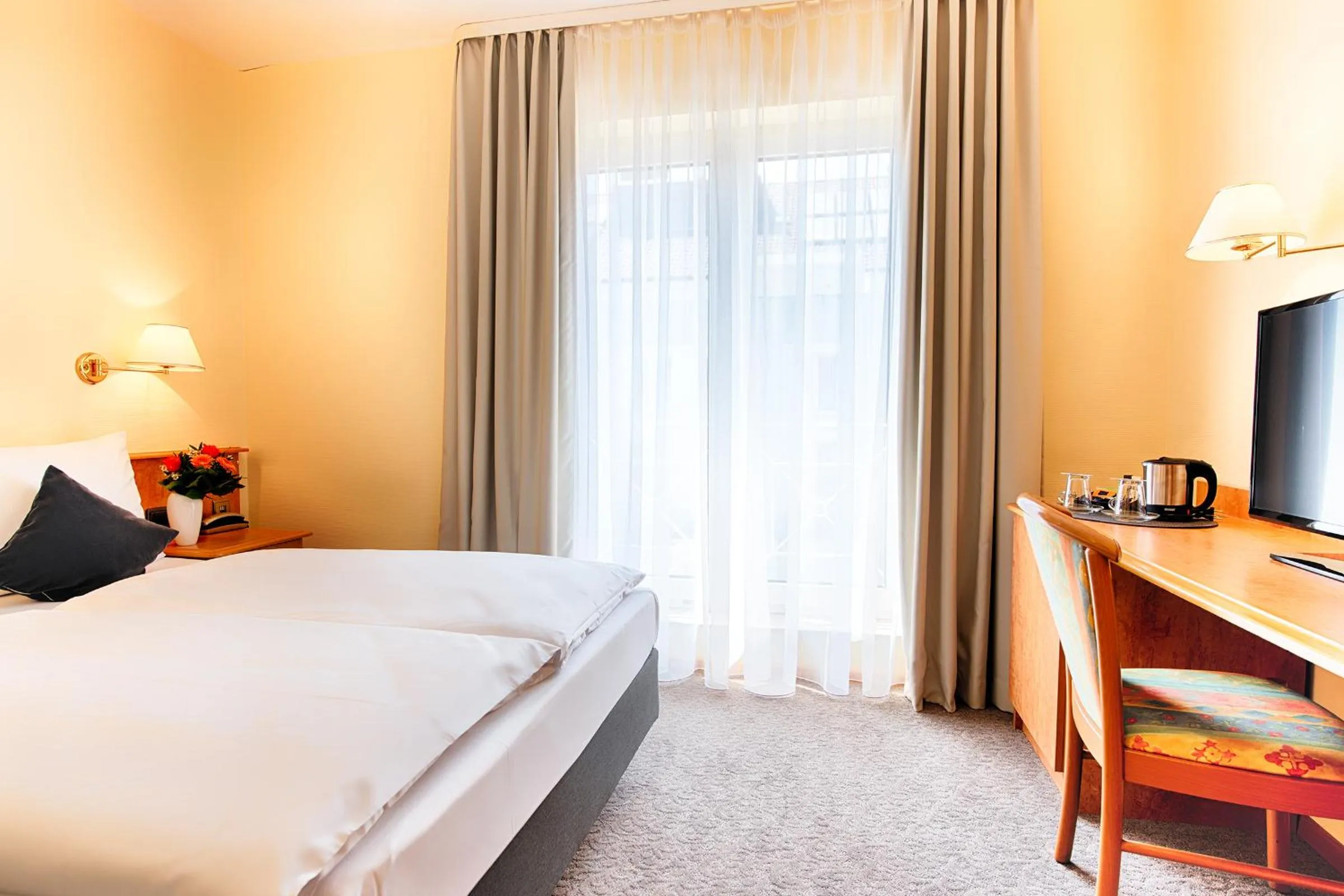 Bed in ACHAT Hotel Bad Dürkheim