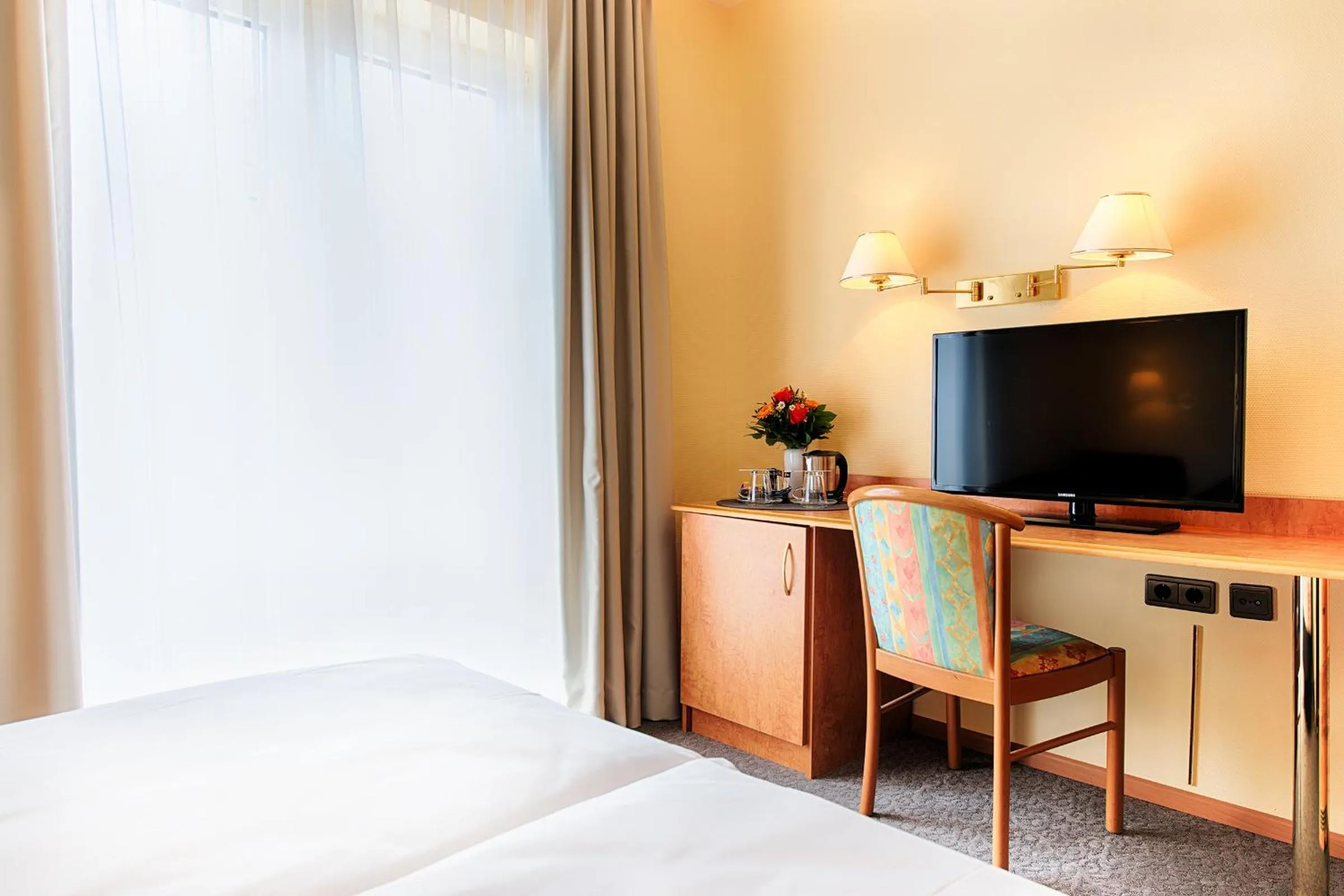 Bed in ACHAT Hotel Bad Dürkheim