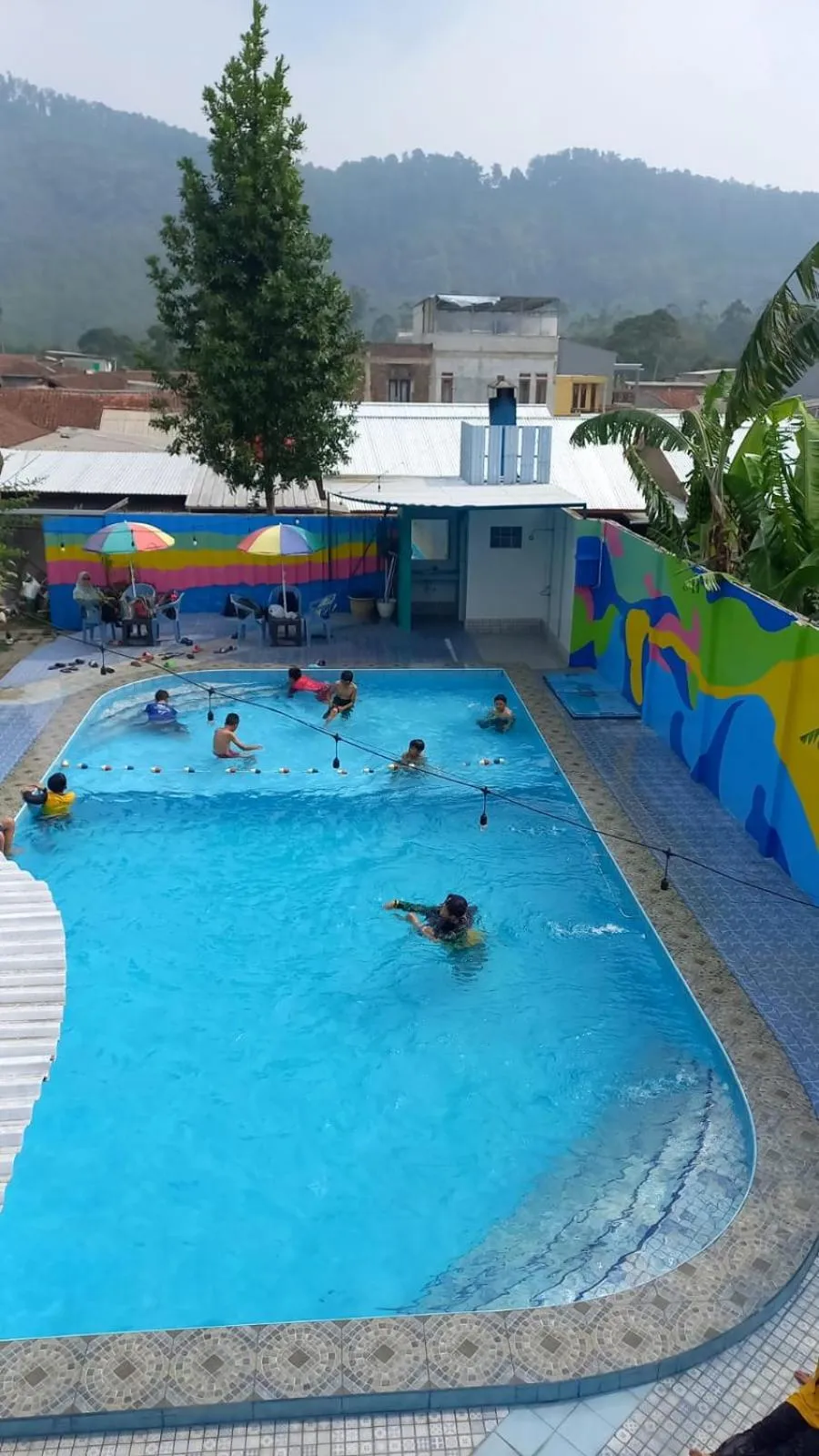 Swimming pool in Maulana Hills Syariah Hotel