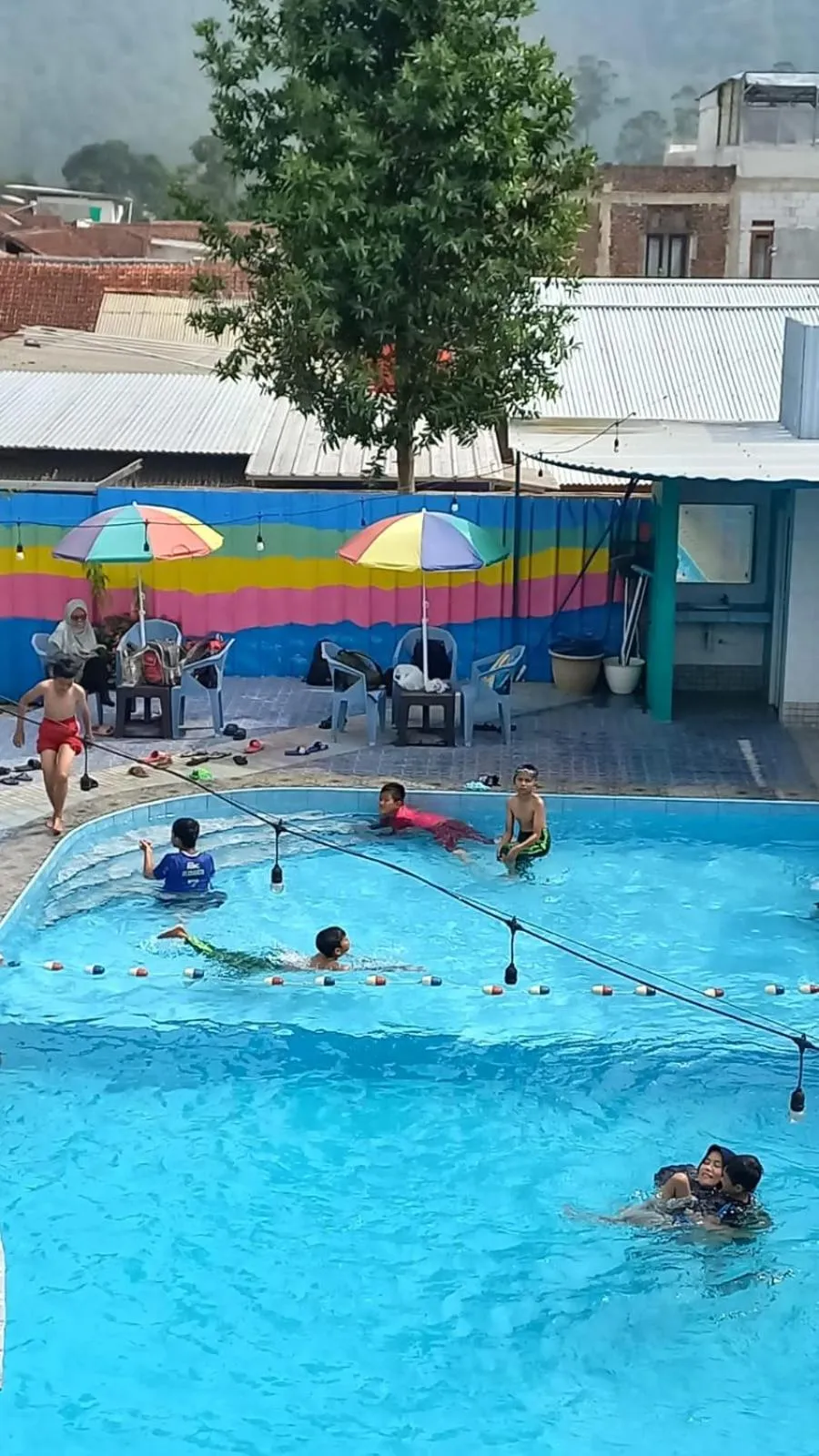 Swimming pool in Maulana Hills Syariah Hotel
