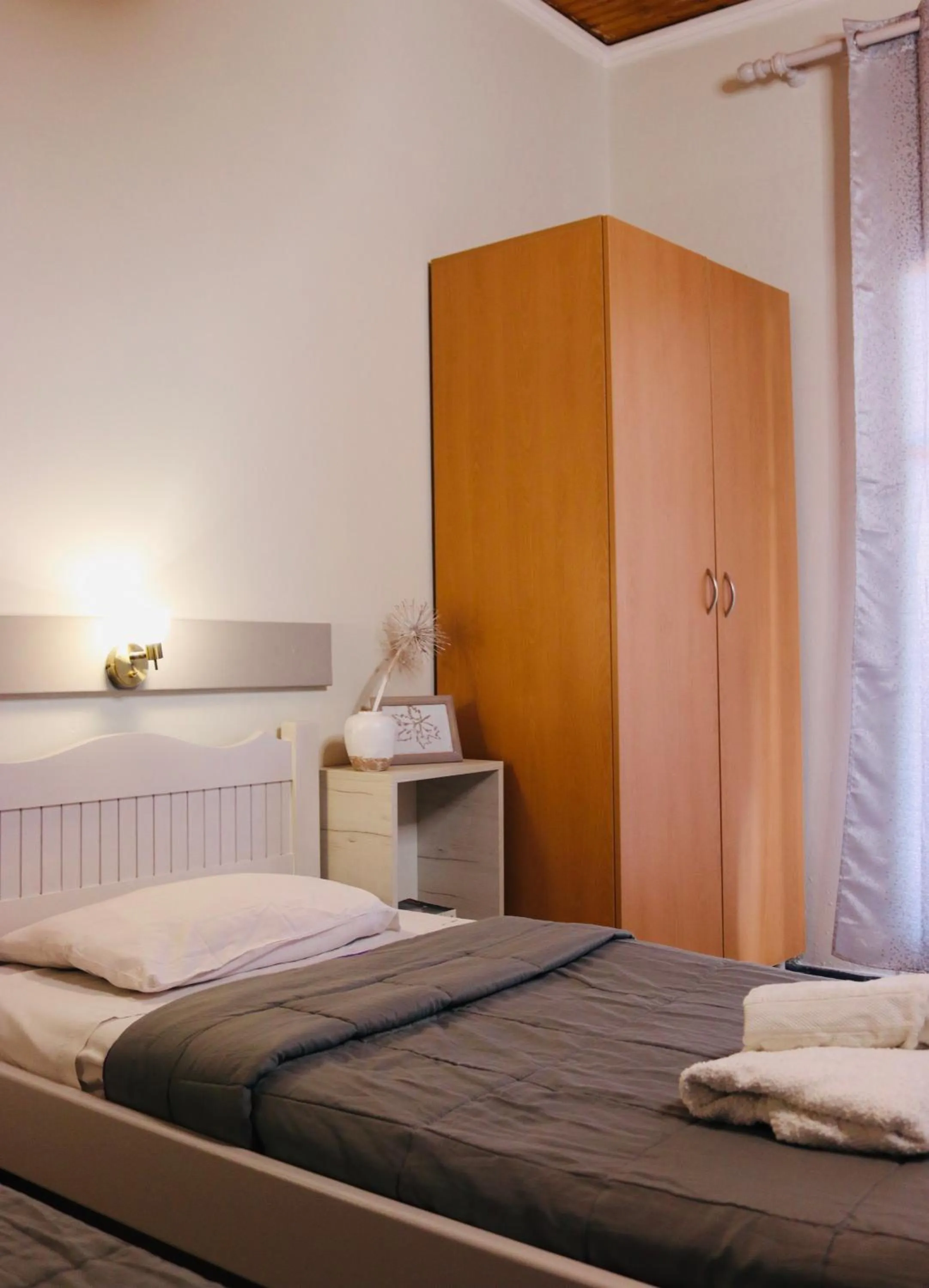 Bedroom, Bed in Elves Studios& Apartment's SIDARI