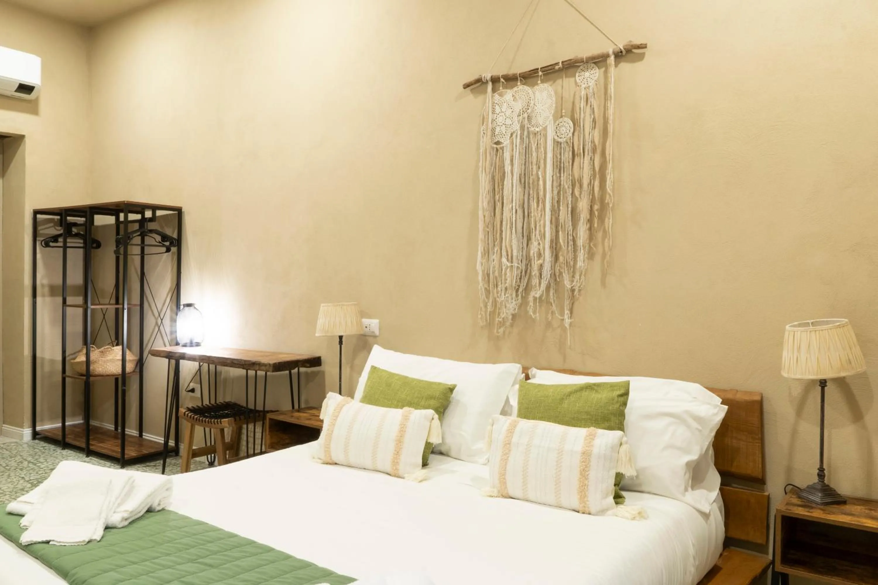 Bed in HOPESTEL Secret Garden Napoli