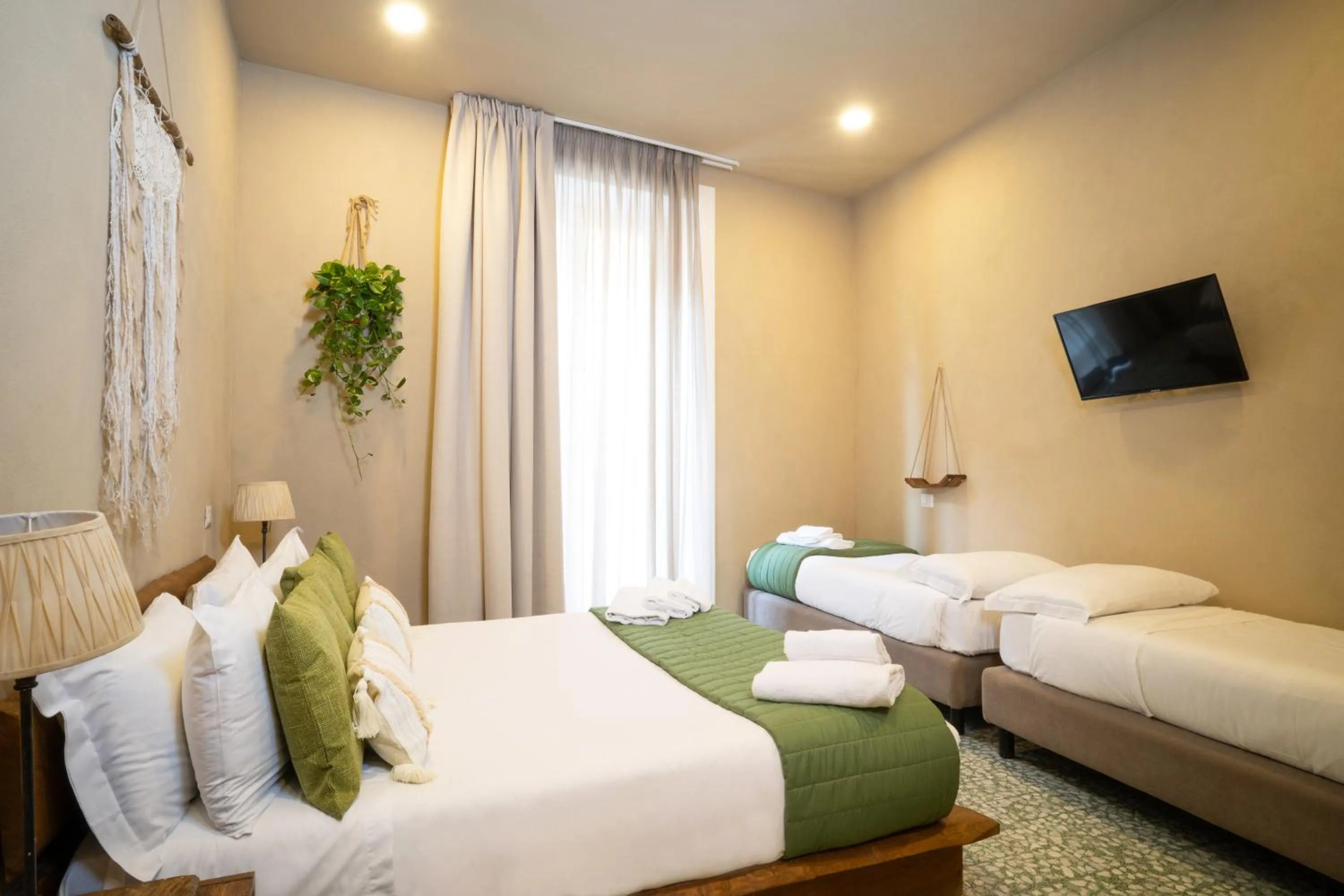 Bed in HOPESTEL Secret Garden Napoli