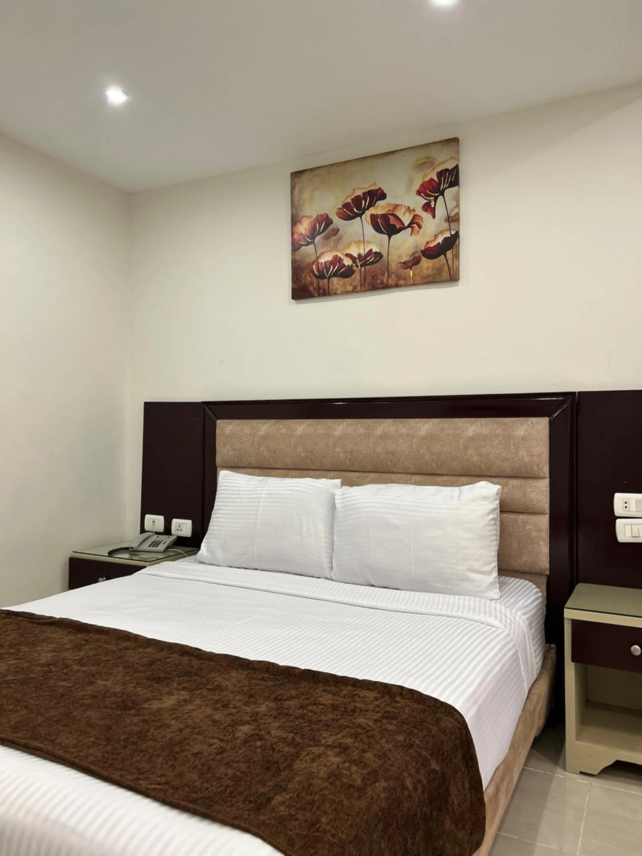 Bed in Jewel Dokki Hotel