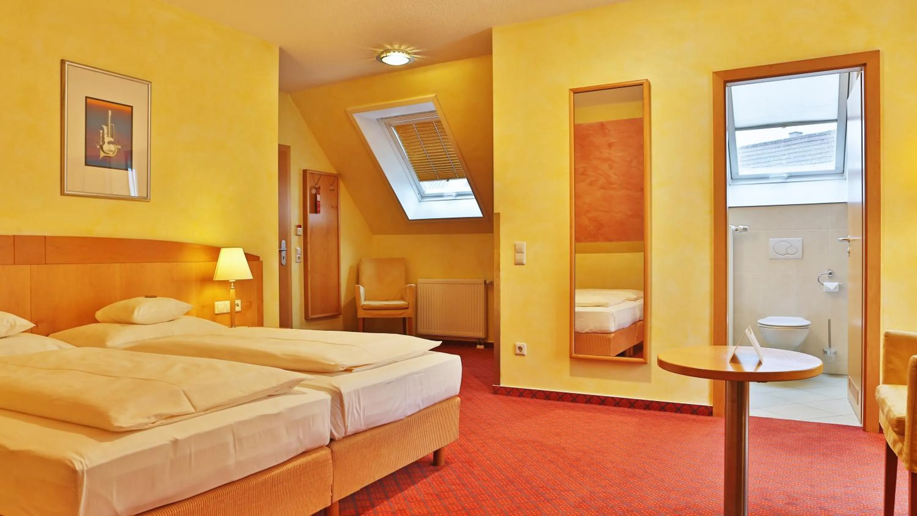 Photo of the whole room, Bed in Businesshotel HEILBRONN- Biberach