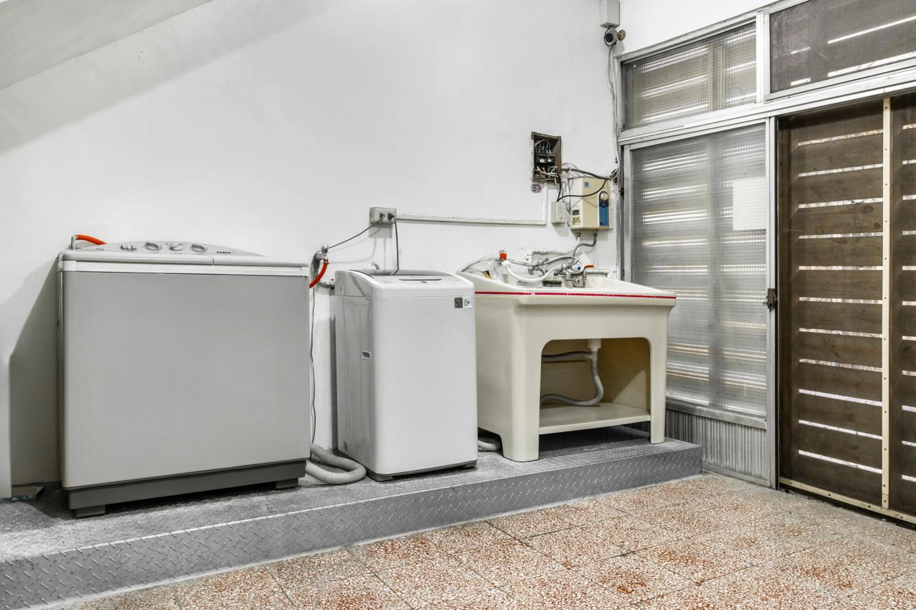 washing machine in Forever Happiness Hostel