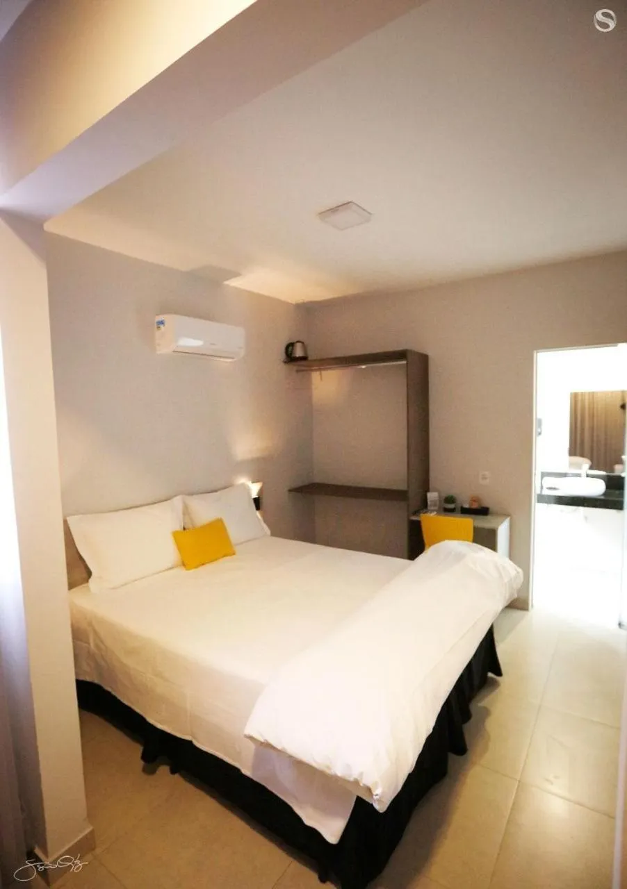 Bed in Aero Inn Hotel