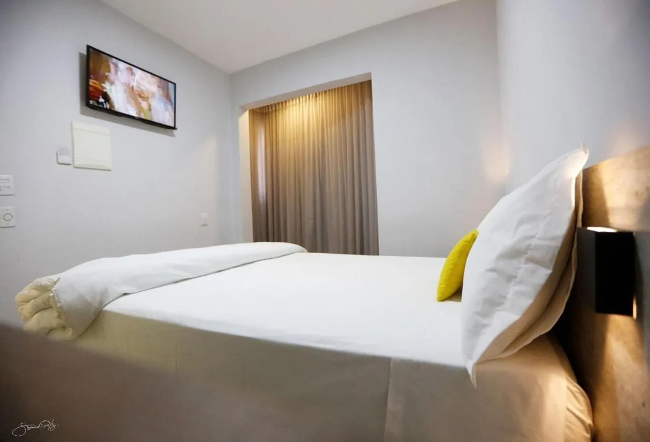 Bed in Aero Inn Hotel