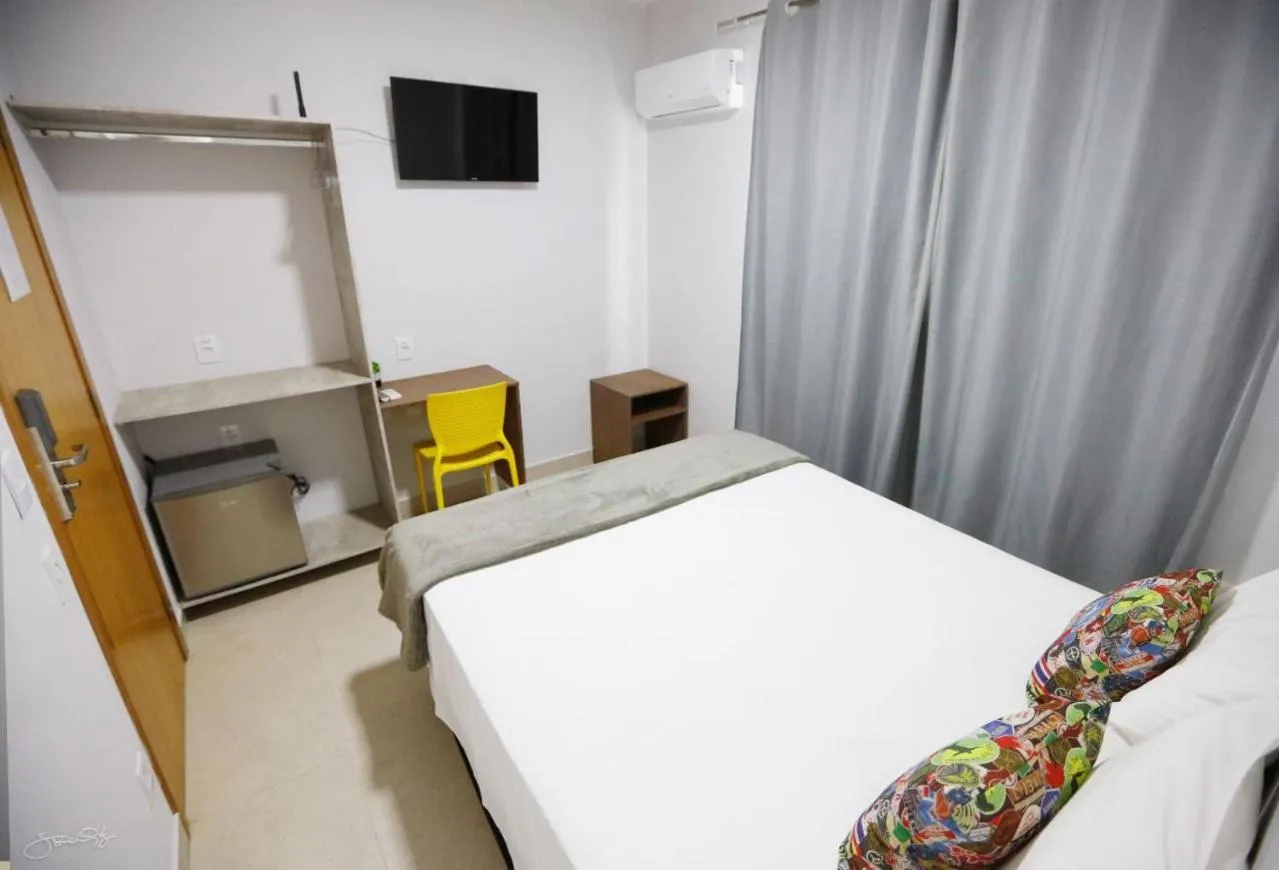 Bed in Aero Inn Hotel