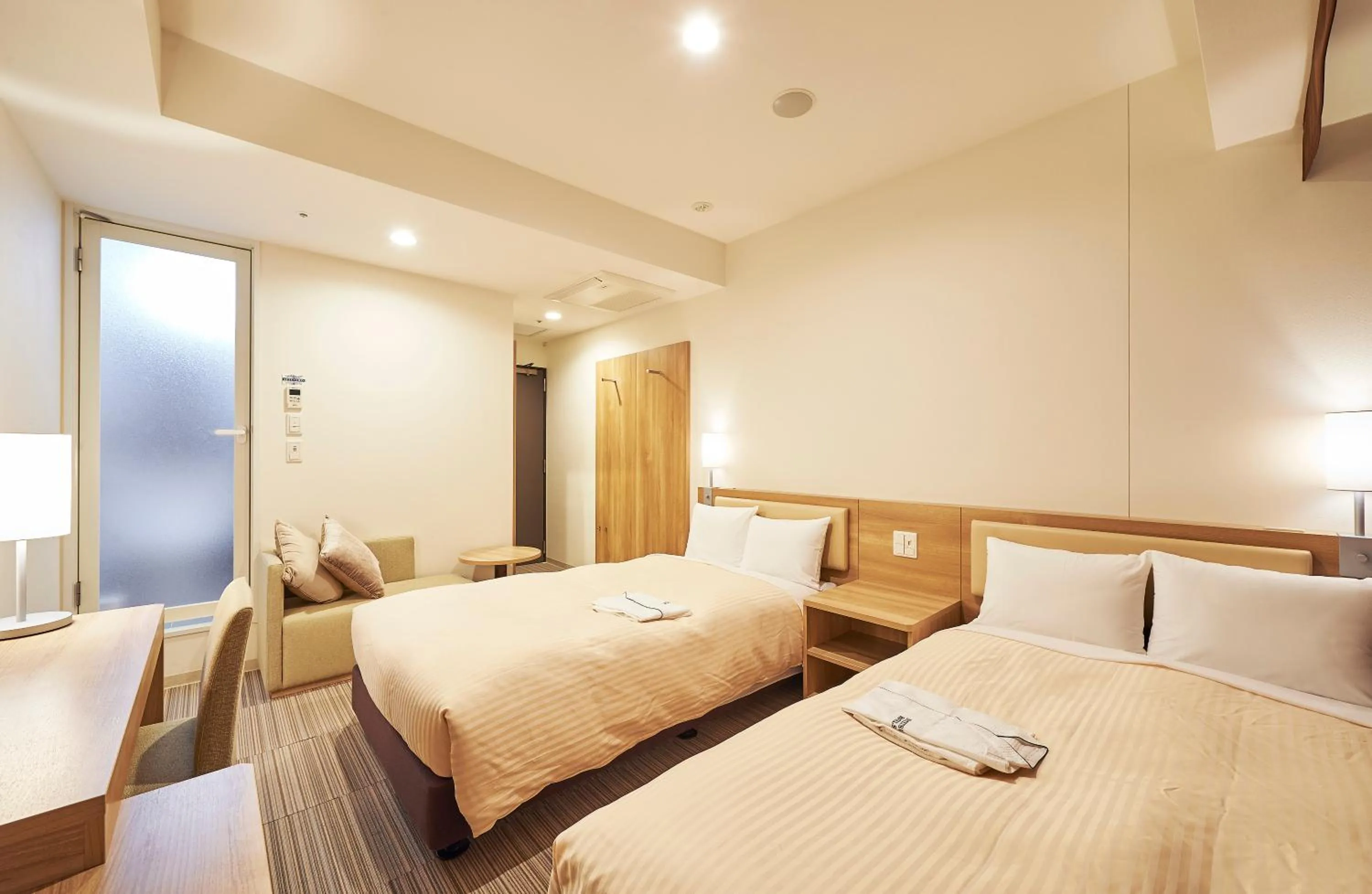Photo of the whole room, Bed in Sotetsu Fresa Inn Kanda-Otemachi