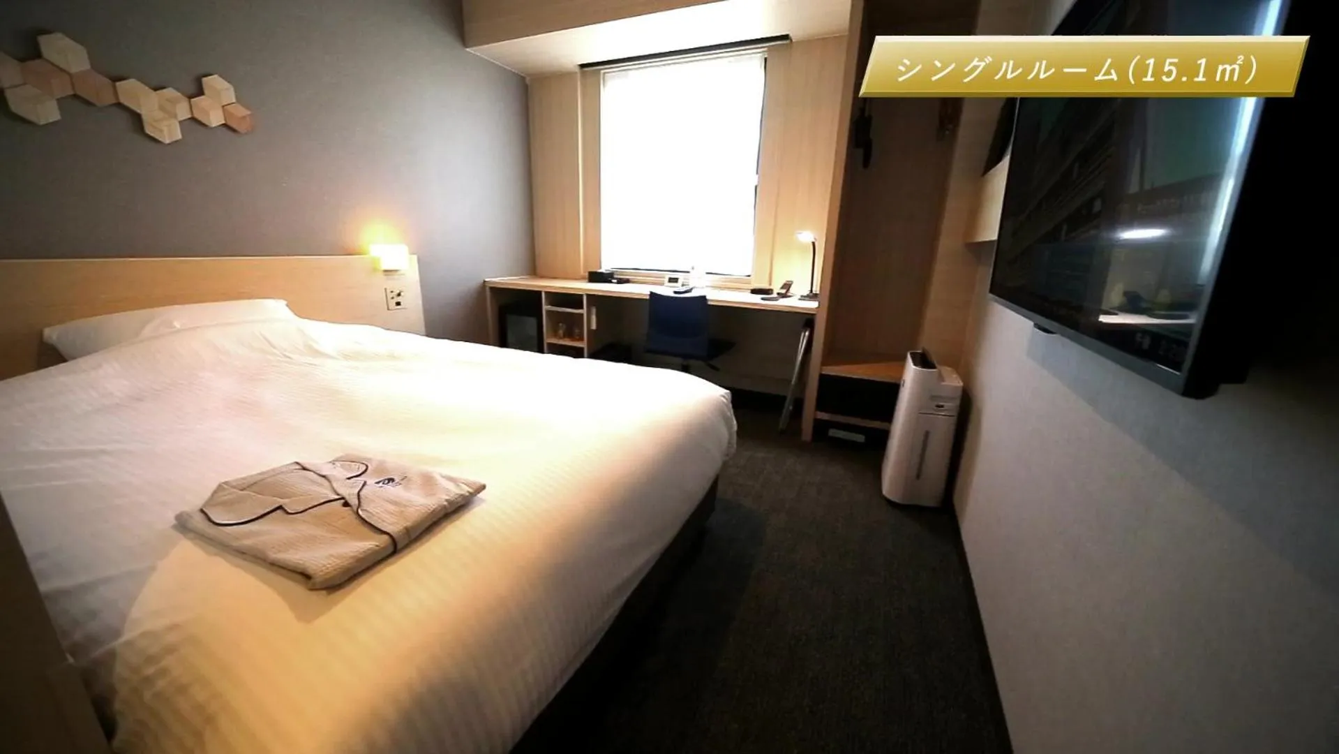 Bed in JR Clement Inn Kochi