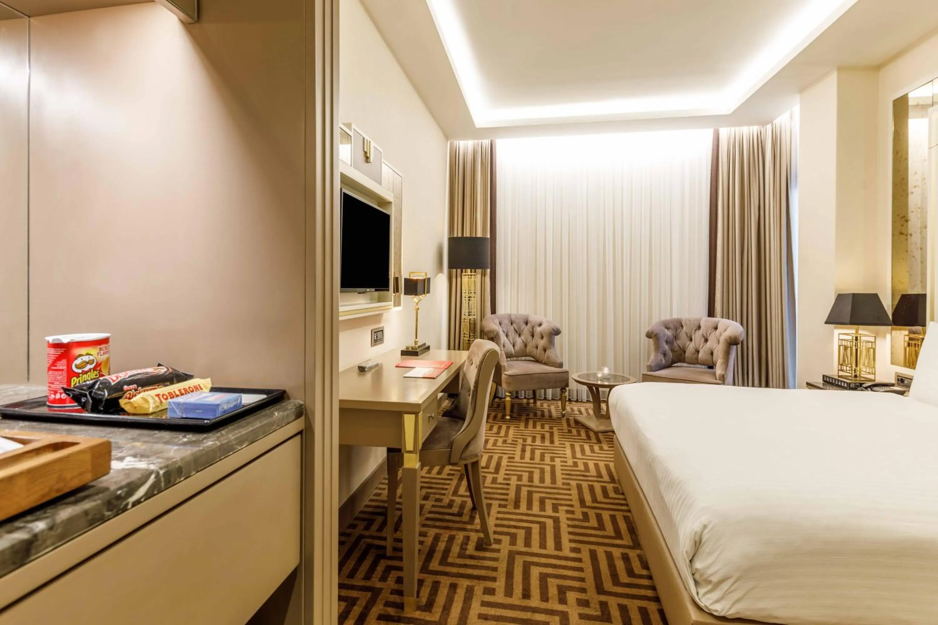 Photo of the whole room, Bed in Ramada by Wyndham Istanbul Golden Horn