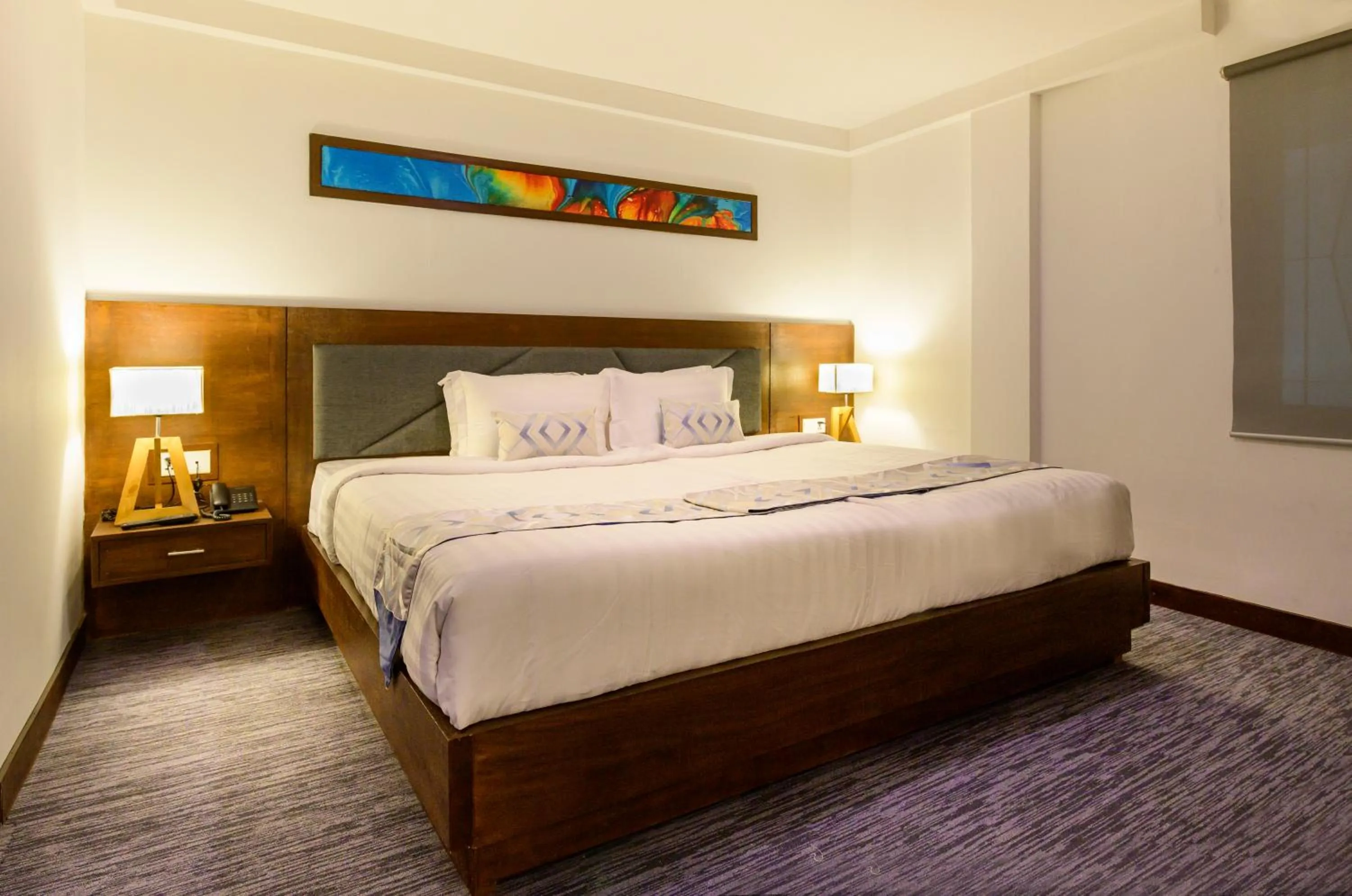 Bed in Hotel Zakaria International