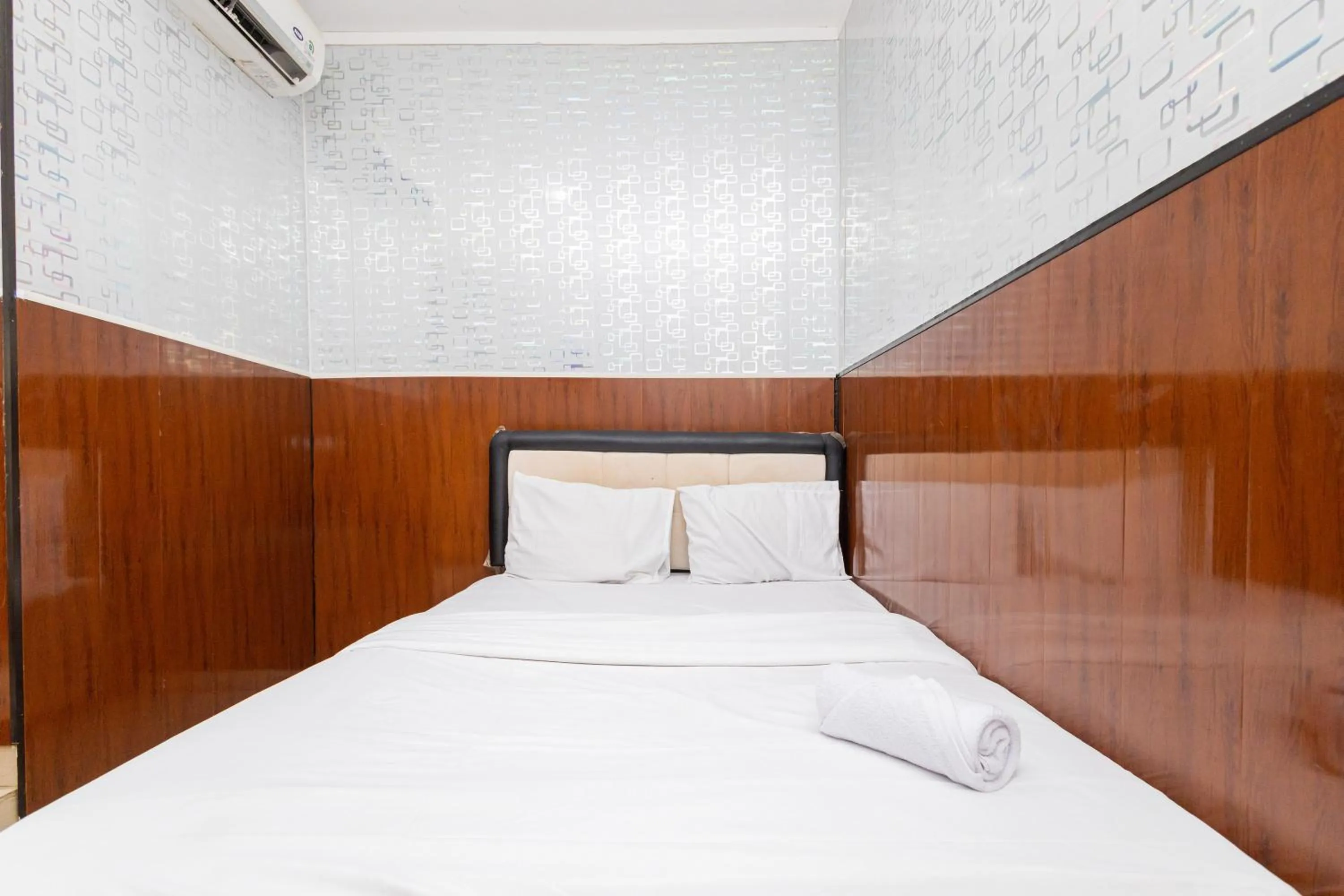 Bed in Alfa Guesthouse Serpong Mitra RedDoorz