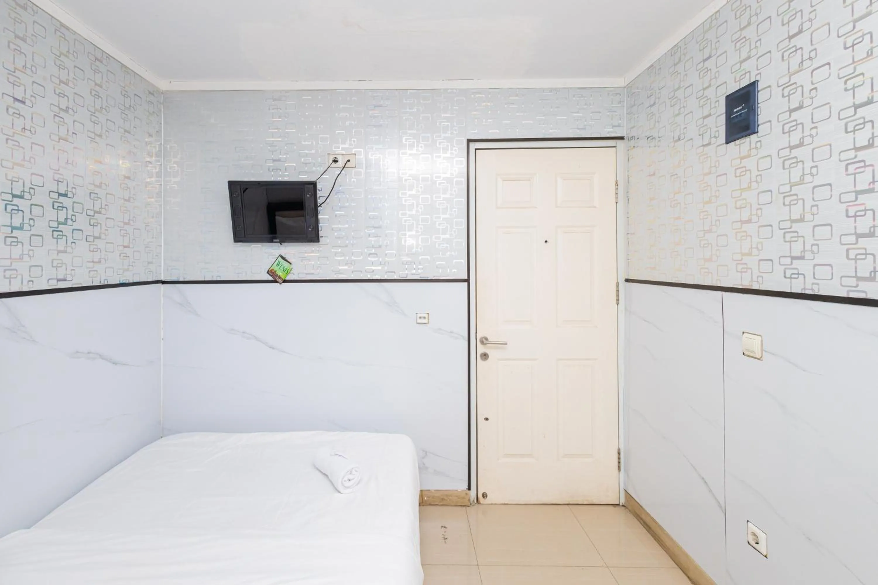 Bed in Alfa Guesthouse Serpong Mitra RedDoorz